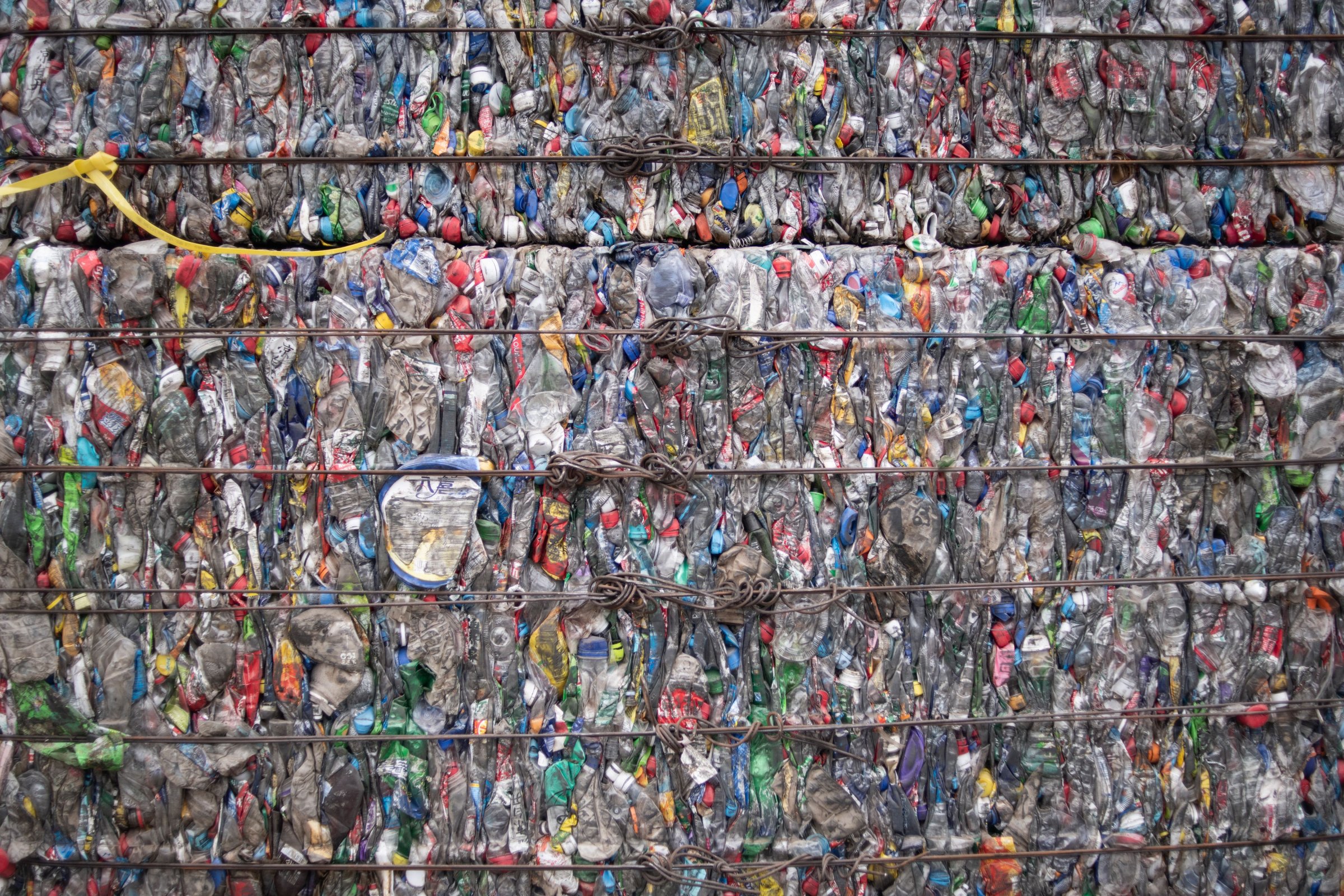 A block of compressed plastic bottles at a plastic waste center on the outskirts of Beijing on May 16, 2018.