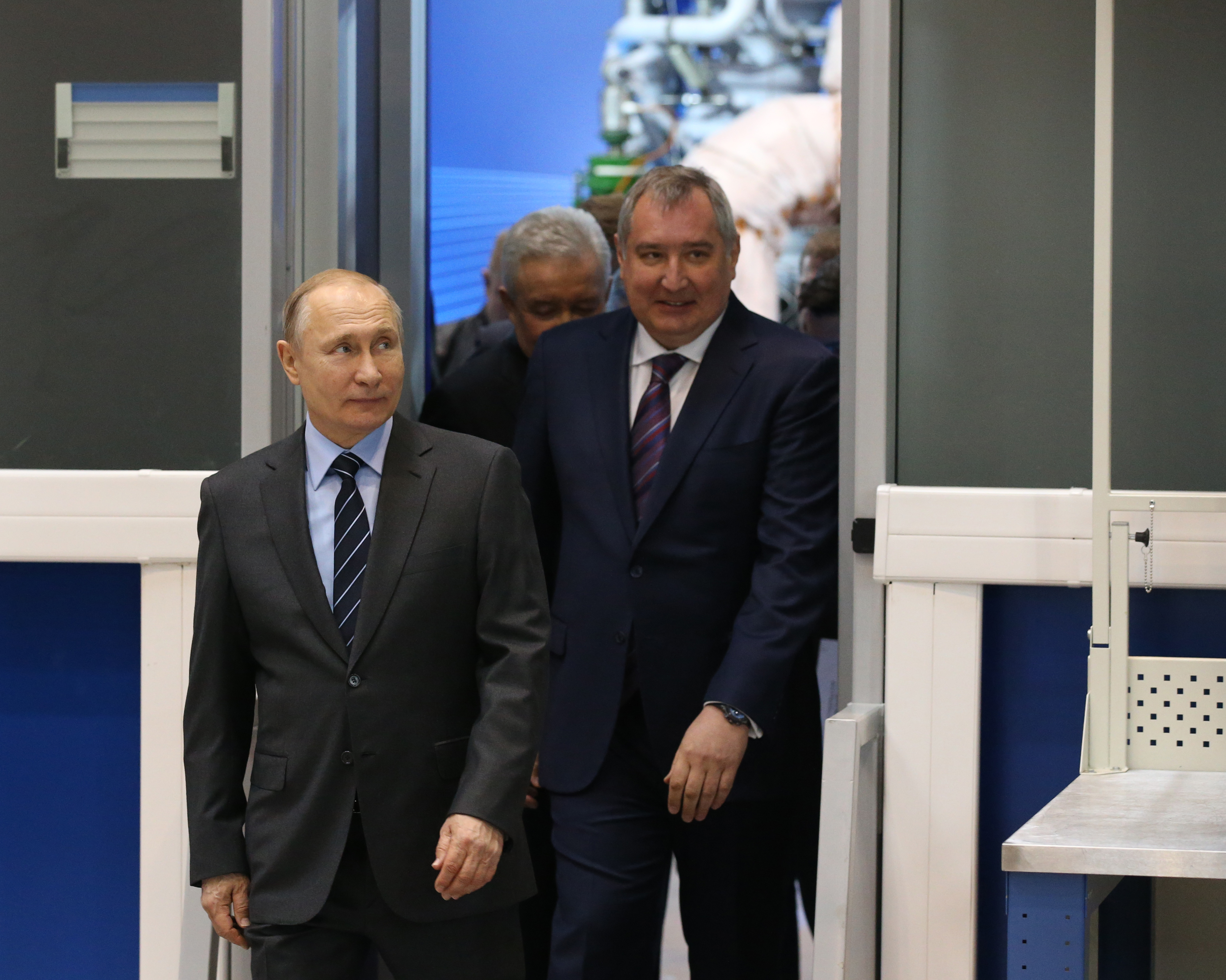 Russian President Vladimir Putin, followed by Roscosmos chief Dmitry Rogozin  enters the hall while visiting NPO Enegromash, a major Russian rocket manufacturer, in Khimki, 
                      northwest of Moscow. (Getty Images; 2019 Mikhail Svetlov)