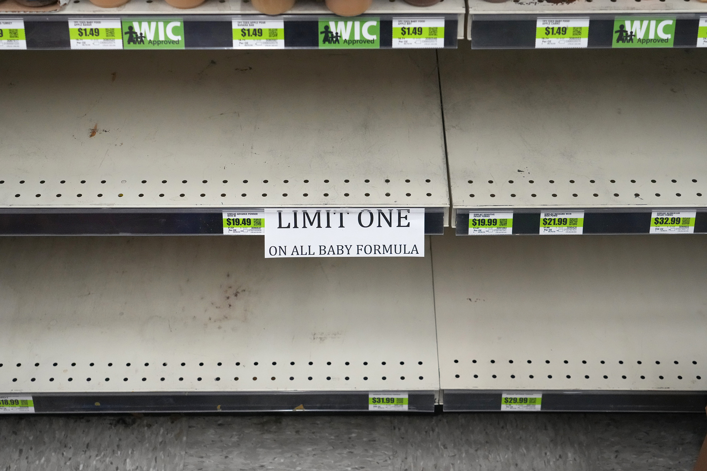 A sign in front of empty shelves notifies customers that they are allowed only one container of baby formula at a store in Provo, Utah, on May 17. (George Frey—Bloomberg/Getty Images)