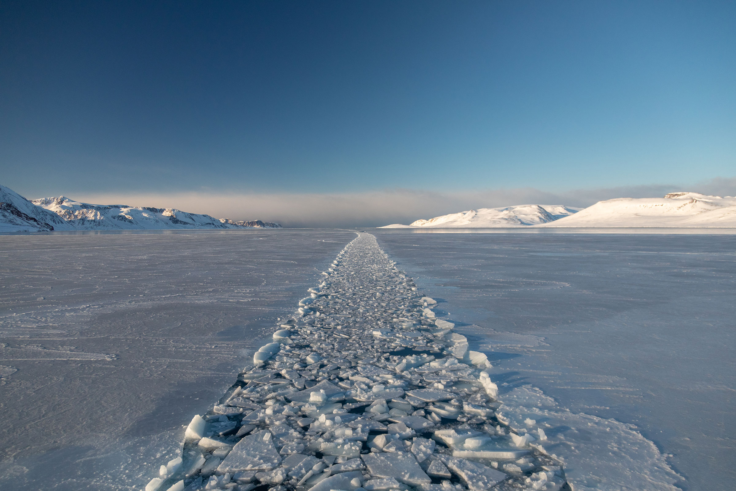 A decade ago, the west coast of Norway’s Svalbard archipelago was impassable by ships until May. Now they can navigate it as early as March, when this 2018 photo was taken. (Photograph by Acacia Johnson)