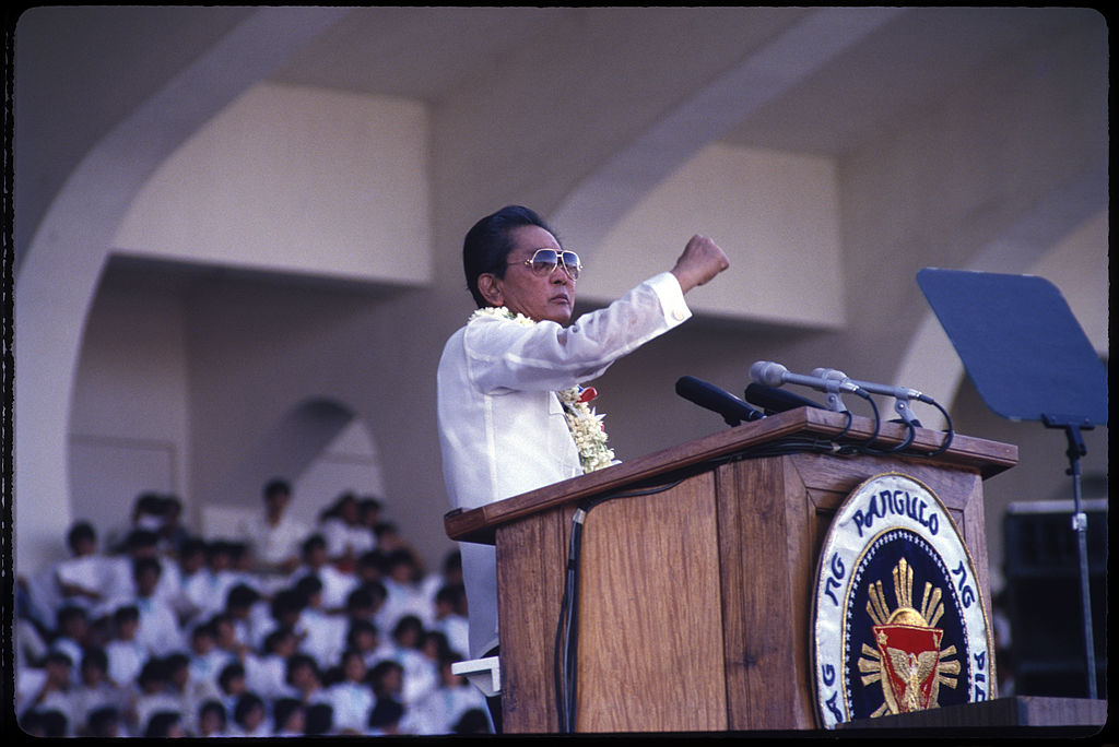 President of the Philippines Ferdinand Marcos (1917 - 1989) gives a pre-election campaign speech to supporters in the run up to the Philippine presidential elections of 1986, Manila, Dec. 7 1985. (Alex Bowie–Getty Image)
