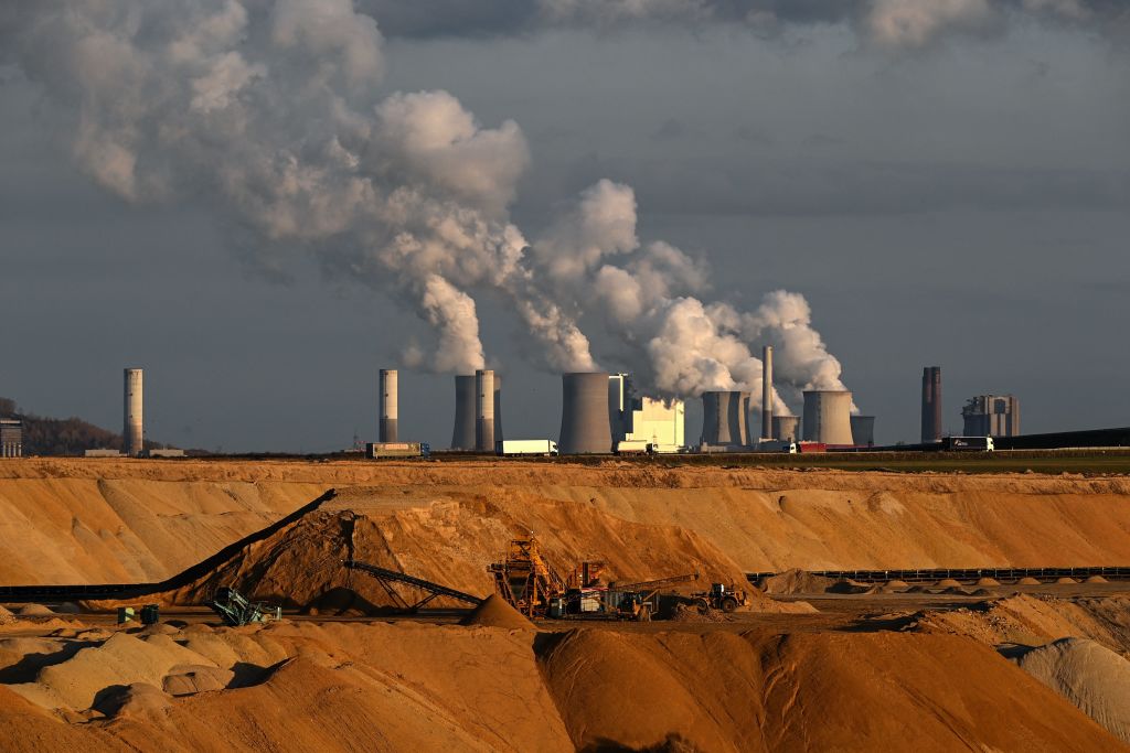 Open-cast lignite mining is seen near the coal-fired power station Neurath of German energy giant RWE in Garzweiler, western Germany, on October 27, 2021. (INA FASSBENDER/AFP—Getty Images)