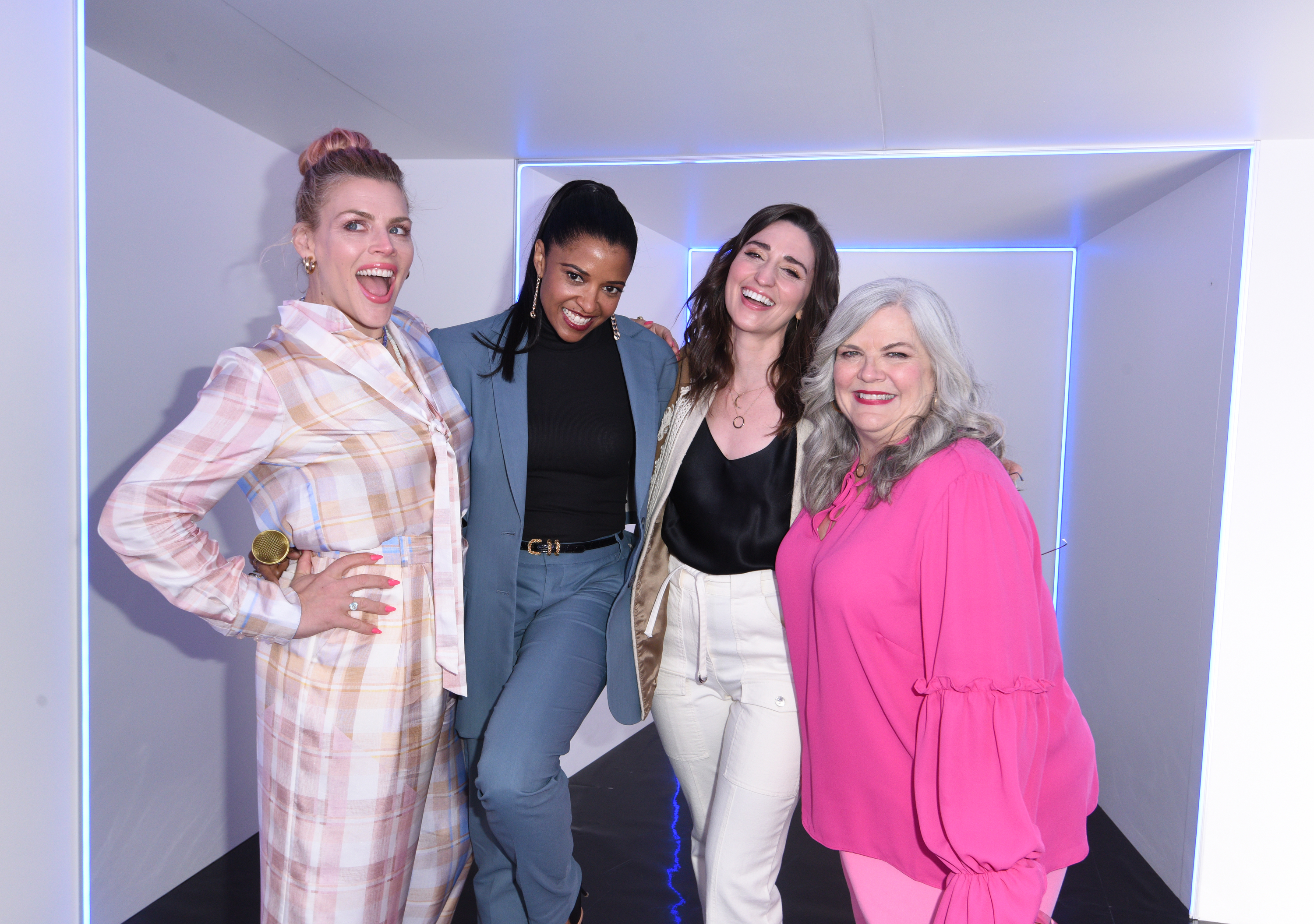 The stars of Girls5Eva, Busy Philipps, Renée Elise Goldsberry, Sara Bareilles, and Paula Pell, at SXSW. (NBCU Photo Bank via Getty Images—TM and © 2022 Peacock TV LLC. All Rights Reserved.)
