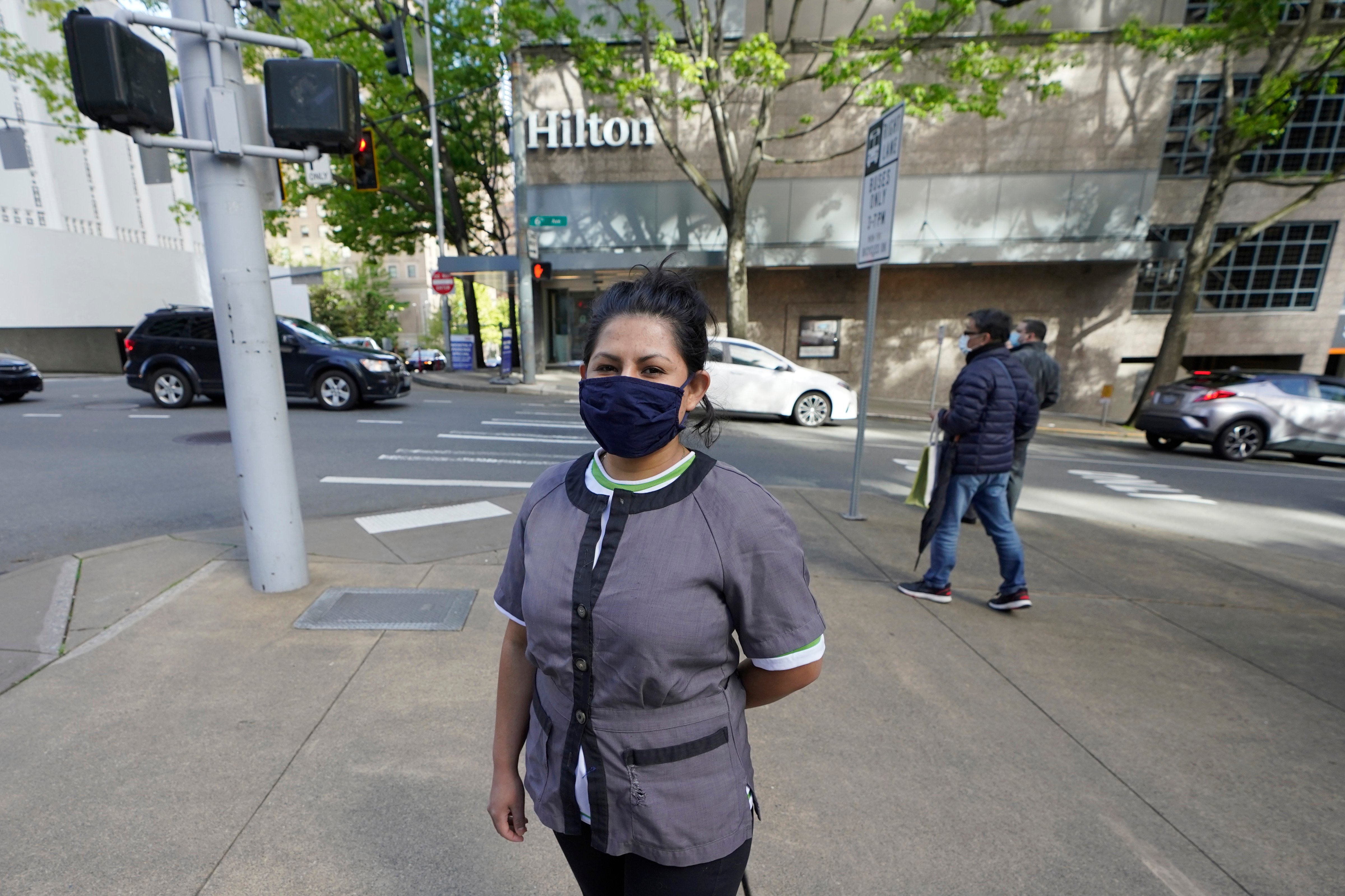 Sonia Guevara outside the Hilton hotel where she works as a housekeeper in downtown Seattle, on May 18, 2022. (Ted S. Warren—AP Photo)