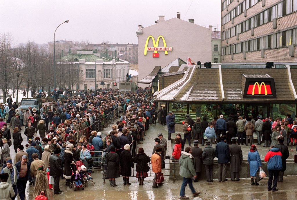 Soviet customers stand in line outside the just opened first McDonald's in the Soviet Union on Jan. 31 1990 at Moscow's Pushkin Square. (Vitaly Armand—AFP/Getty Images)