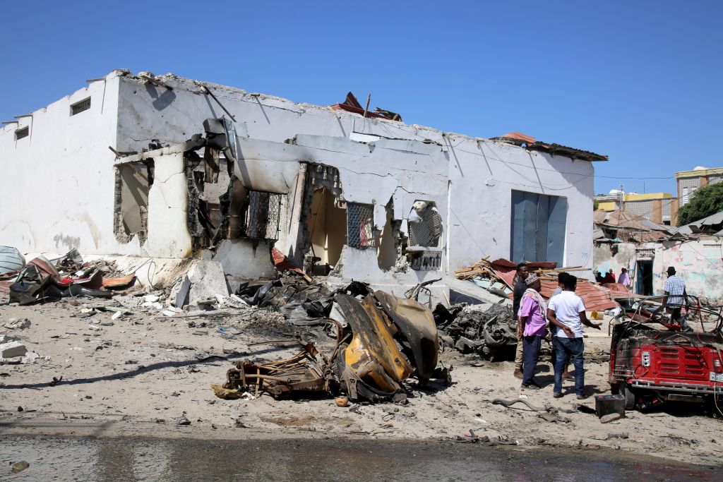 A view of damage at the scene after an al-Shabab suicide car blast targeted a security convoy in Mogadishu, Somalia on Jan. 12, 2022. (Sadak Mohamed—Anadolu Agency/Getty Images)