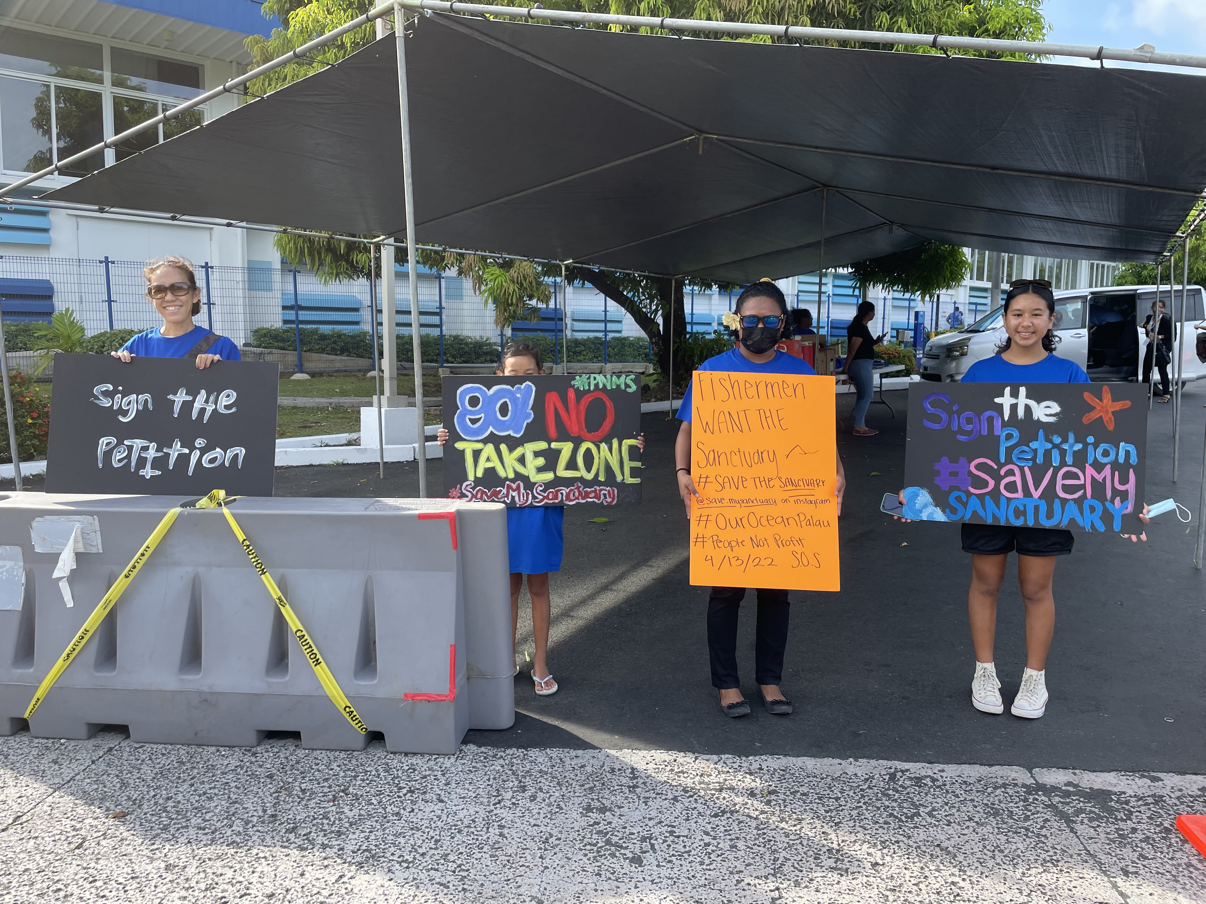 Protesters outside the Our Ocean conference in Koror, Palau on April 13, 2022. (Amy Gunia)