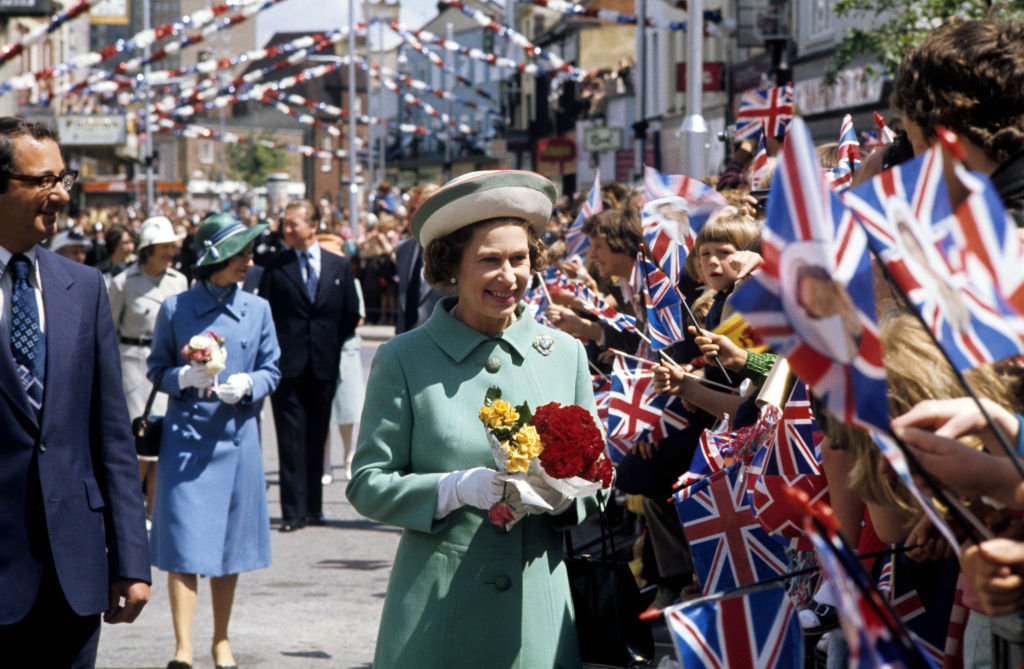 Queen Elizabeth II on a walkabout in Portsmouth, England, during her Silver Jubilee tour of the United Kingdom in 1977. (Ron Bell—PA Images/Getty Images)