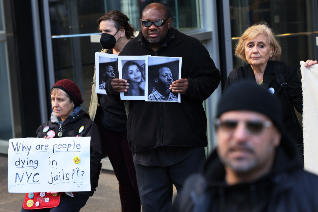 Activists gathering on March 21, 2022, outside of the New York City office of Gov. Kathy Hochul to bring attention to the conditions at Rikers Island following the death of a detainee a few days earlier, while in custody in the jail. (Michael M. Santiago—Getty Images)