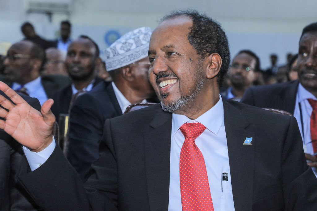 Newly elected Somalia President Hassan Sheikh Mohamud waves after he was sworn-in, in the capital Mogadishu, on May 15, 2022. (Hasan Ali Elmi—AFP/Getty Images)