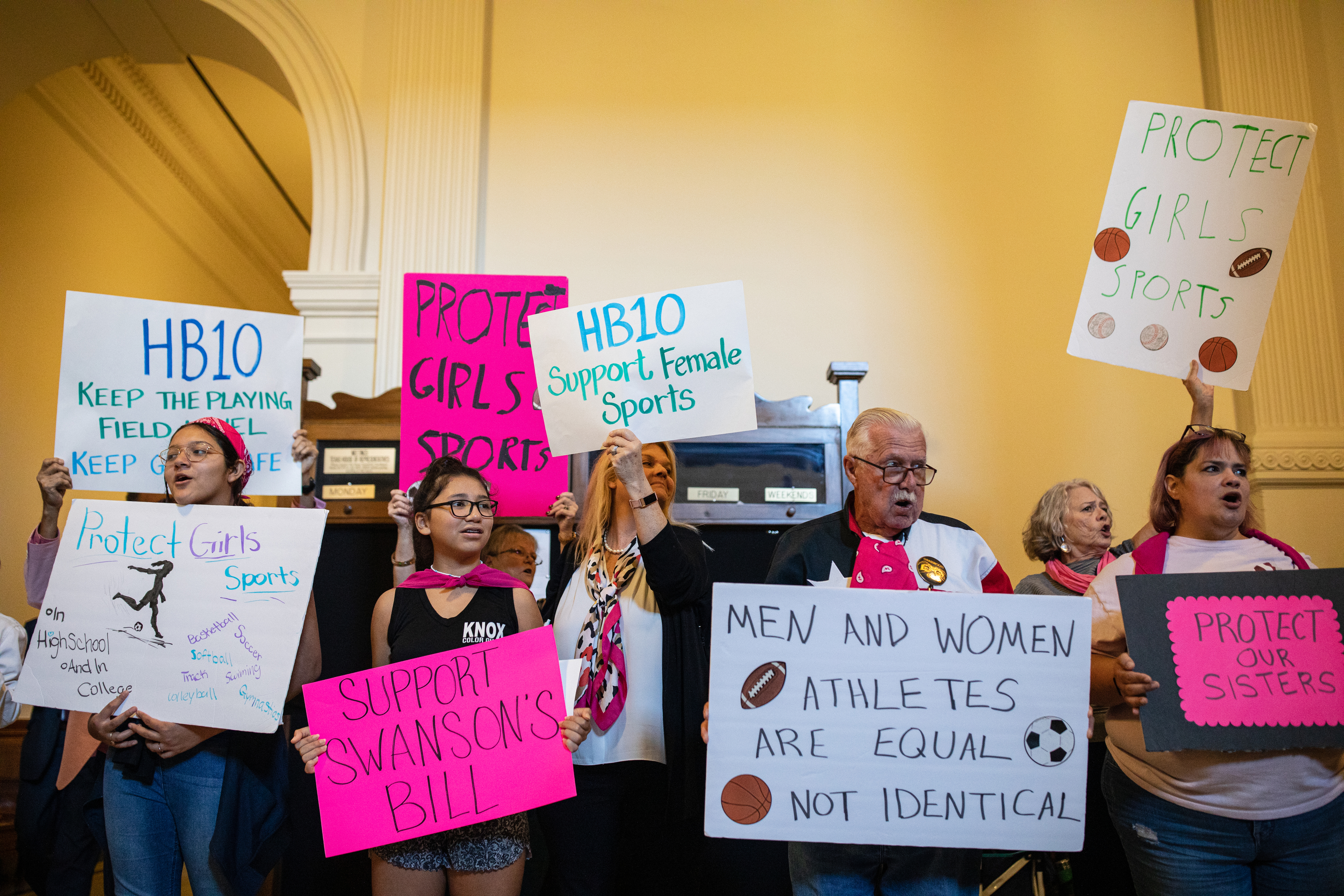 Demonstrators supporting a bill that bans trans girls and women from participating in women's athletics gather at the Texas State Capitol on the first day of the 87th Legislature's third special session in Austin, on Sept. 20, 2021. (Tamir Kalifa—Getty Images)
