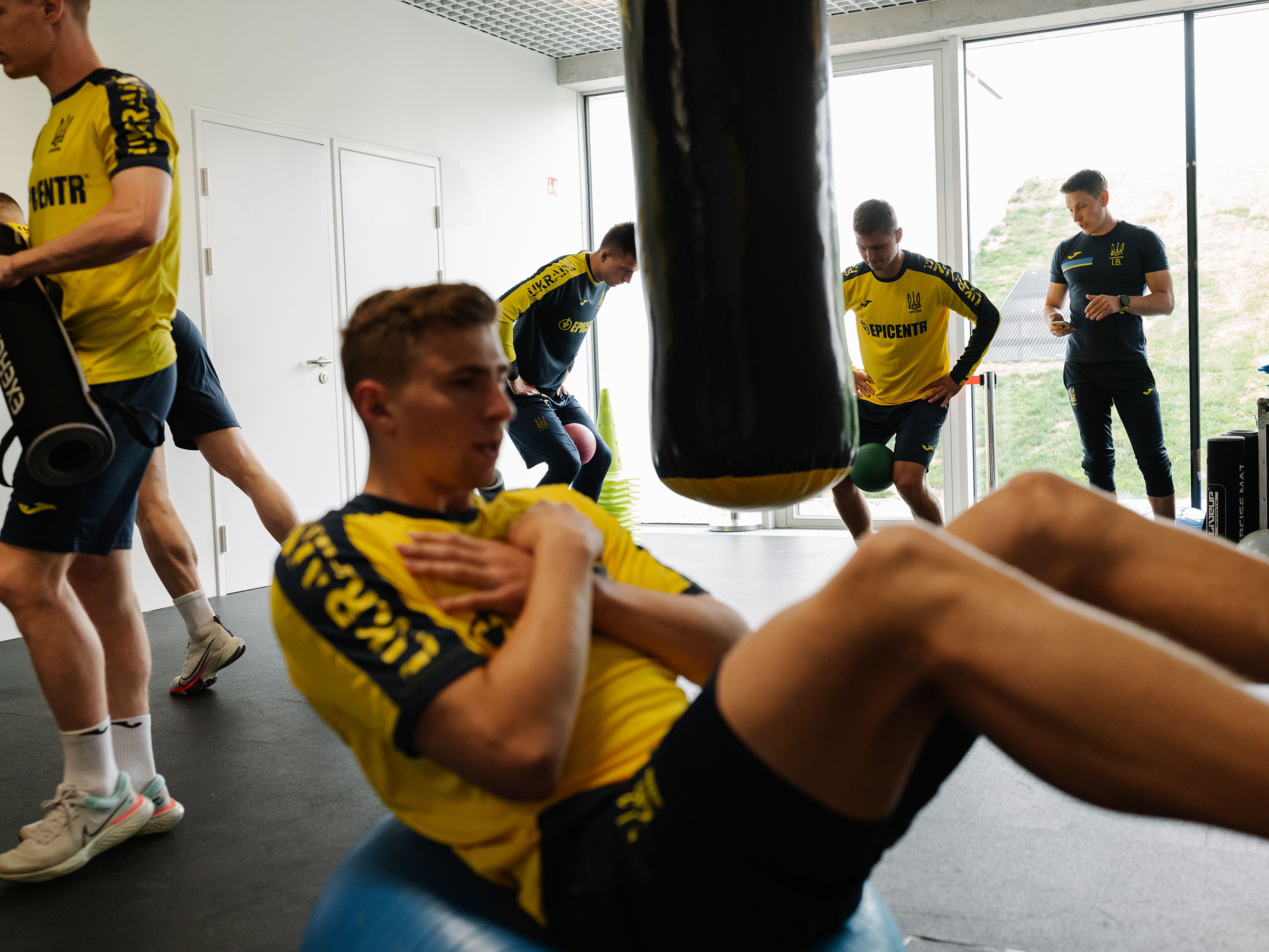 Members of the team train in the gym at the National Football Center in Brdo, Slovenia. (Ciril Jazbec for TIME)