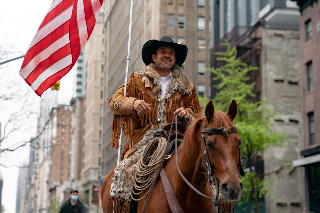 Otero County Commission Chairman and Cowboys for Trump co-founder Couy Griffin rides his horse on 5th avenue on May 1, 2020 in New York City. Griffin has said he was not planning to vote to certify results  from their recent primary. (Jeenah Moon—Getty Images)