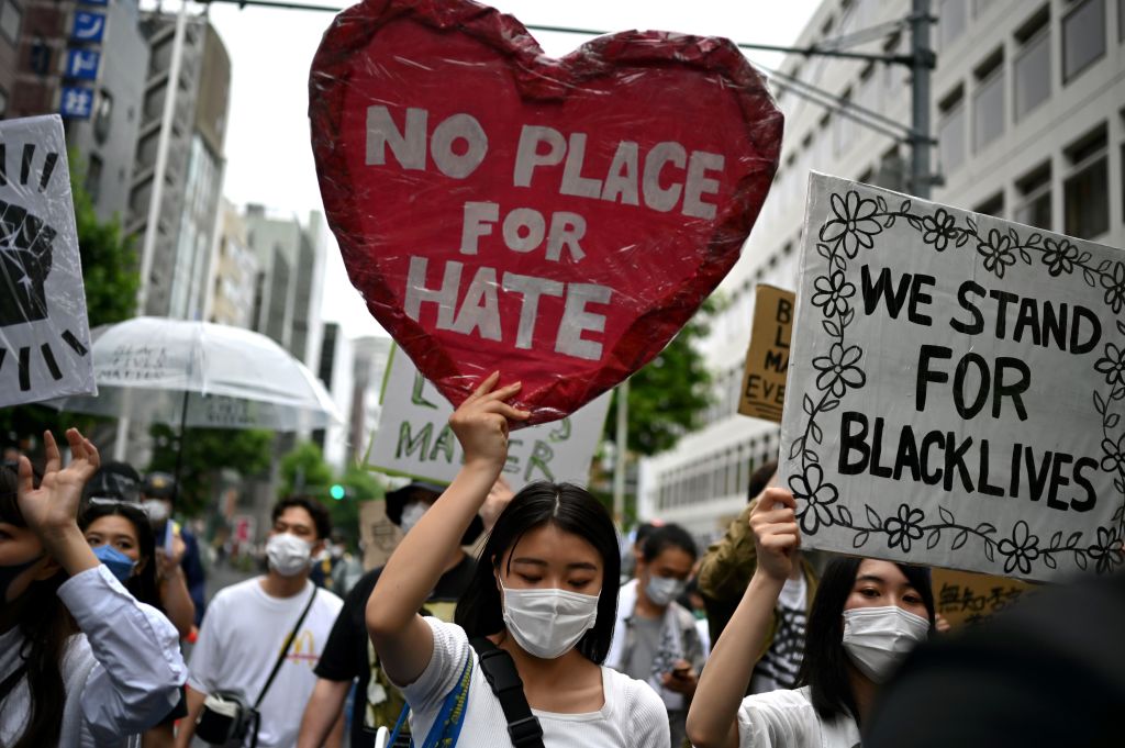 People take part in a Black Lives Matter protest march in central Tokyo on June 14, 2020. (Charly Triballeau—AFP/Getty Images)