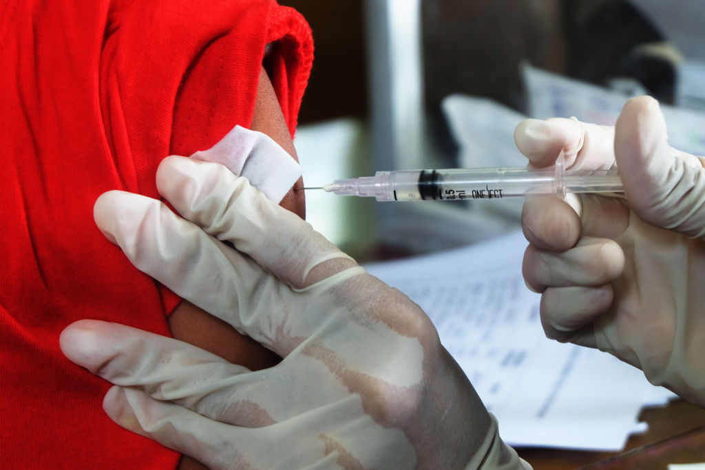 The Parepare Police Covid-19 Vaccination Team, injects a