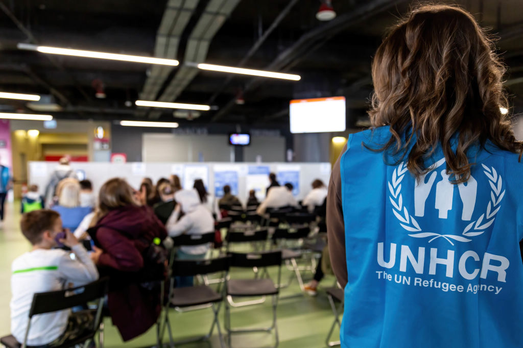 UNHCR staff supports Ukrainian refugees as they wait in