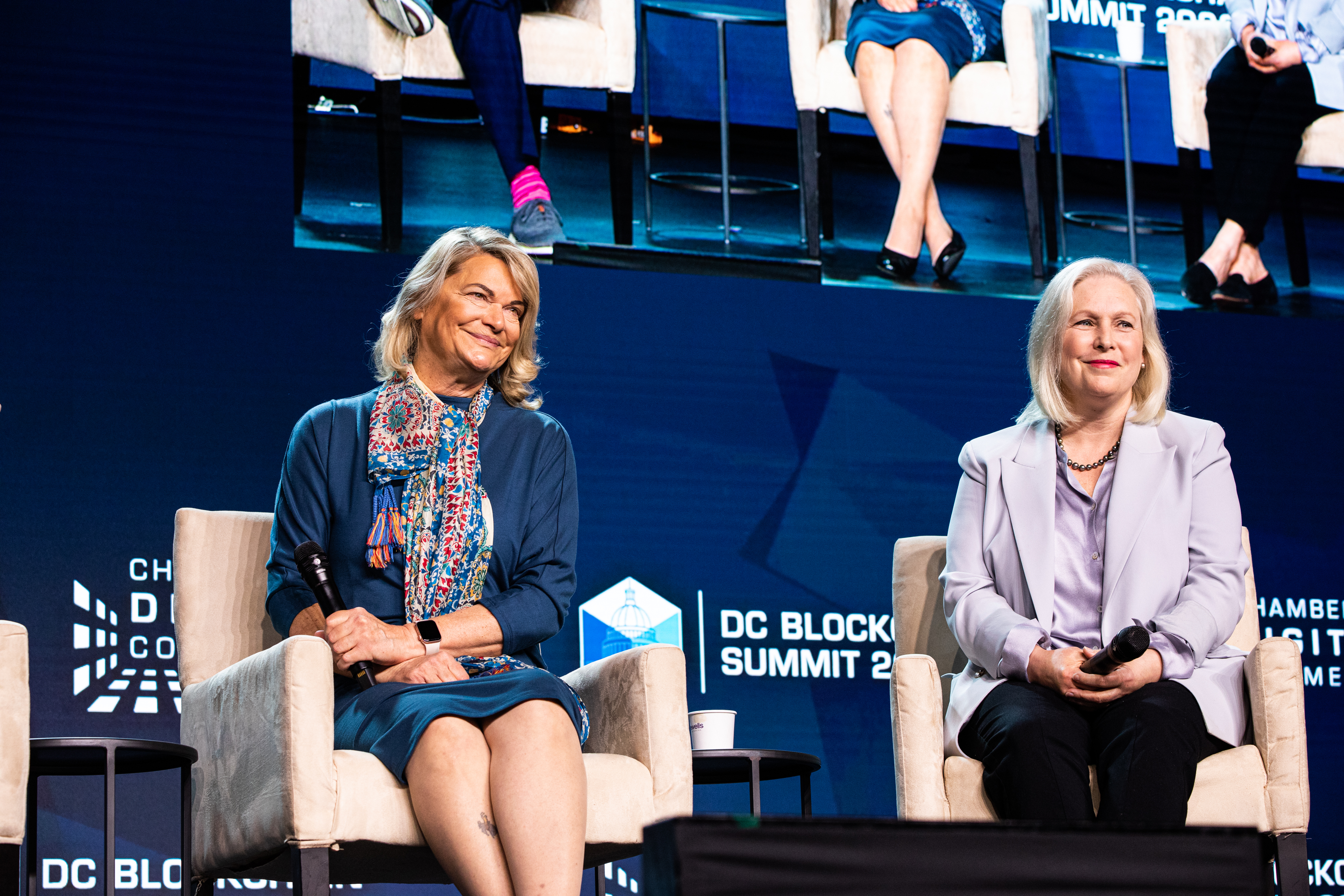 Senators Cynthia Lummis, left, and Kirsten Gillibrand at the DC Blockchain Summit in Washington, D.C. in May 2022. (Valerie Pleasch/Bloomberg via Getty Images)