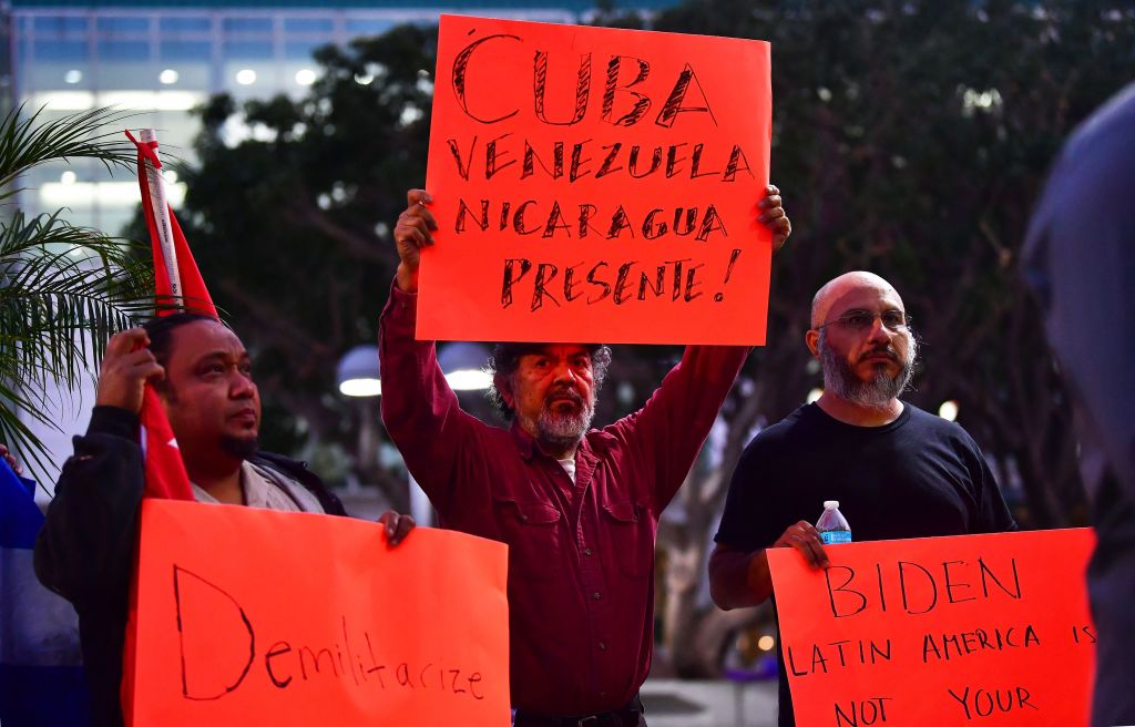 Activists in Los Angeles on June 2, 2022 denounce U.S. President Joe Biden for excluding Cuba, Venezuela and Nicaragua from the Summit of the Americas (FREDERIC J. BROWN/AFP via Getty Images)