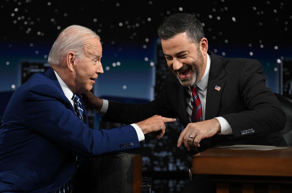 President Joe Biden speaks with host Jimmy Kimmel as he makes his first in-person appearance on 