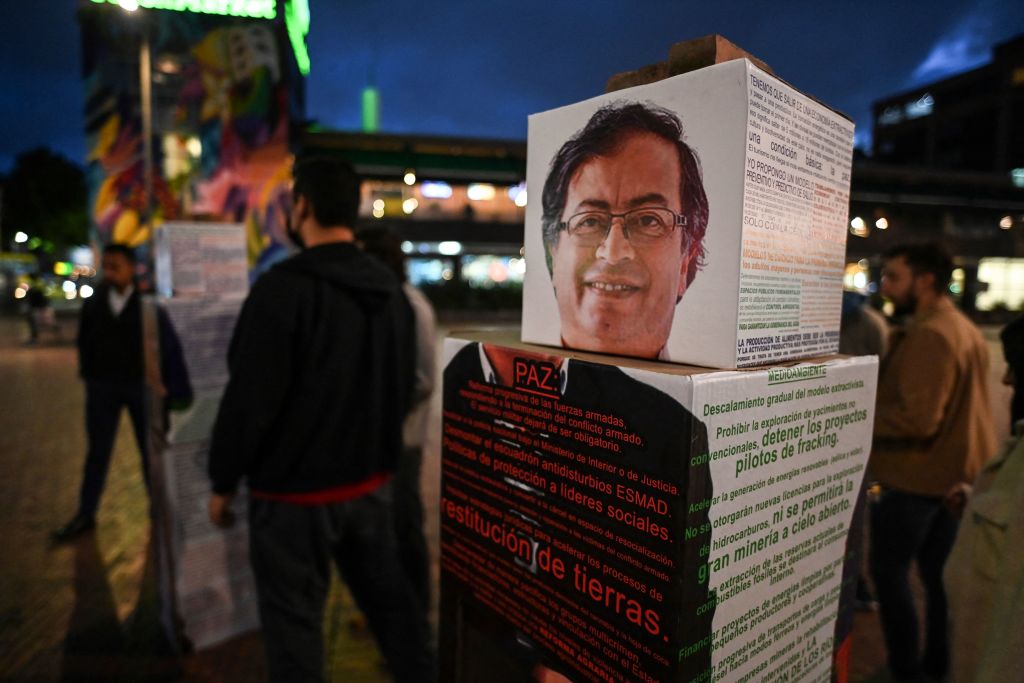 Propaganda of Colombian left-wing presidential candidate Gustavo Petro is displayed on a street in Bogota, on June 16, 2022, - Colombians head to the polls on June 19 for a run-off to choose their new president, either leftist former guerrilla Gustavo Petro or eccentric millionaire construction mogul Rodolfo Hernandez. (Photo by Juan BARRETO / AFP) (Photo by JUAN BARRETO/AFP via Getty Images) (AFP via Getty Images)