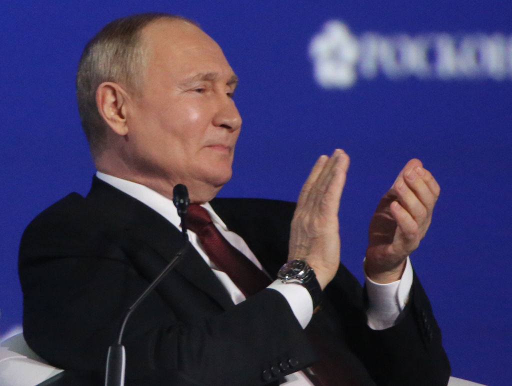Russian President Vladimir Putin applauds at the plenary session during the Saint Petersburg Economic Forum SPIEF 2022,  in Saint Petersburg, Russia, on June 17, 2022. (Getty Images)
