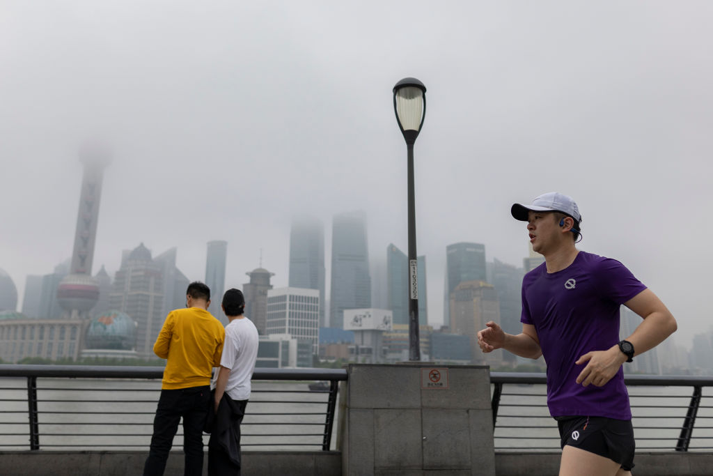 A man runs along the Bund on June 1, 2022 in Shanghai, China. (Hu Chengwei/Getty Images)