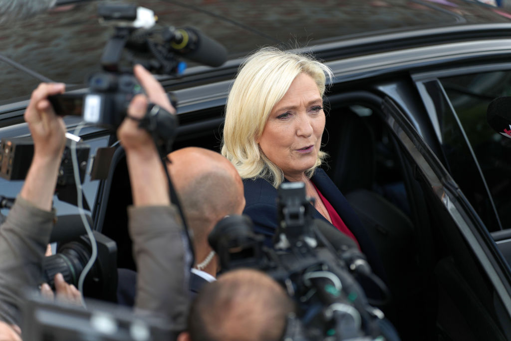 French Far-right leader Marine Le Pen talks with journalists on June 12, 2022 in Henin-Beaumont, France. (Sylvain Lefevre—Getty Images)