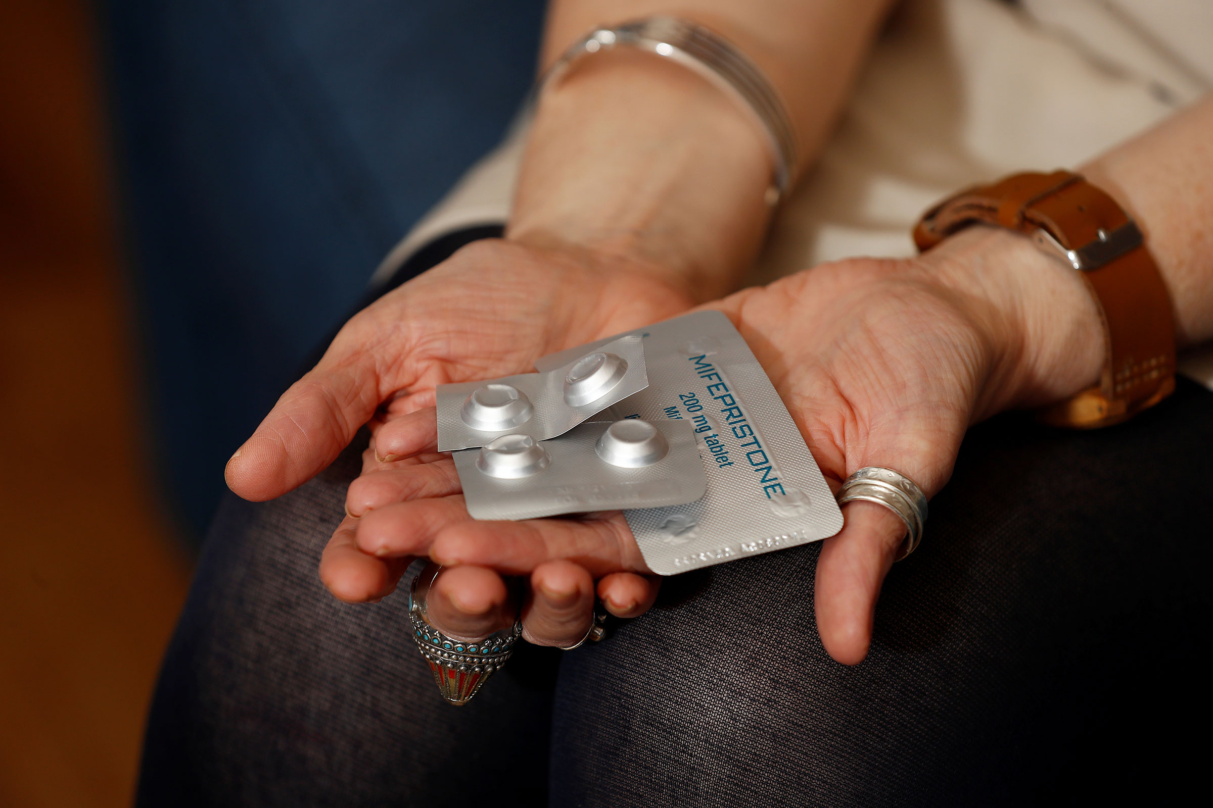 Naomi Connor, Co-Convener of Alliance for Choice, holds medication that helps to bring about a medical abortion, in Belfast, Northern Ireland, on April 7, 2020. (Jason Cairnduff—Reuters)
