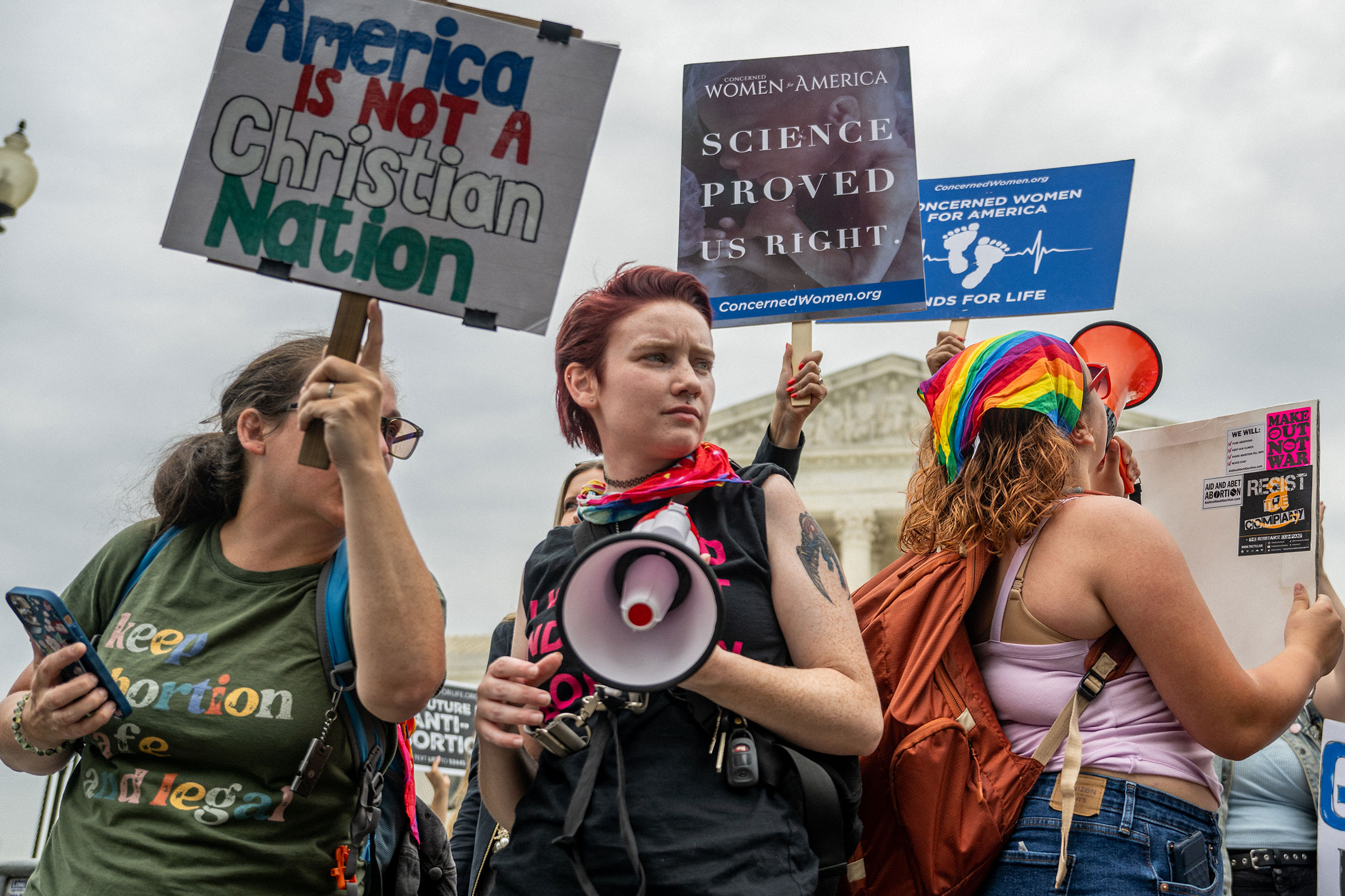 Anti-abortion and abortion rights demonstrators rally in front of the Supreme Court Building on June 21. (Brandon Bell—Getty Images)