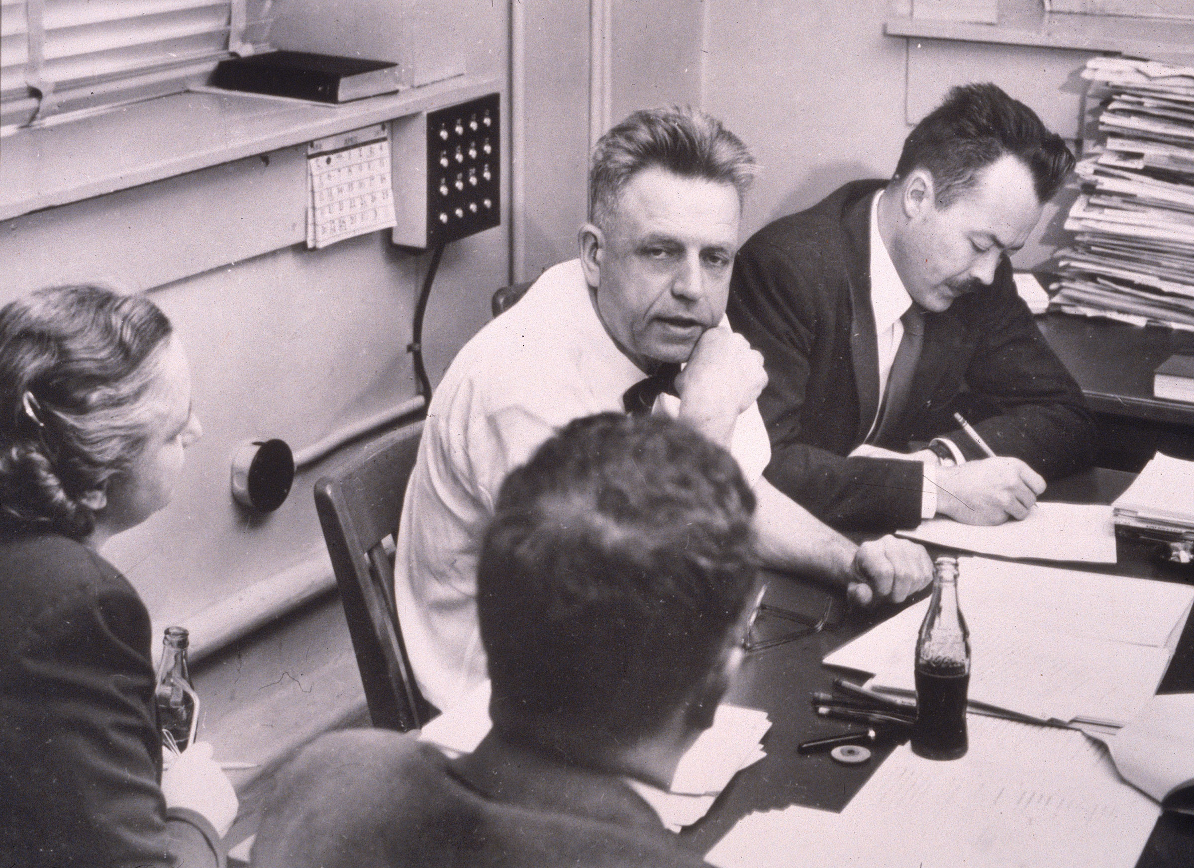 American sexuality researcher Alfred Kinsey (1894 - 1956) works with his staff while preparing the final manuscript of his book 'Sexual Behavior In The Human Female,' 1953. (Hulton Archive/Getty Images)