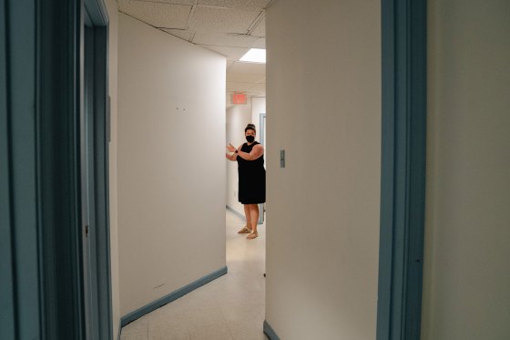 OB/GYN Diane Horvath, co-founder of Partners in Abortion Care, chats with contractor Reuben Pemberton about renovating an empty space where she and Certified Nurse-Midwife Morgan Nuzzo plan to start their abortion clinic in College Park, MD, Tuesday, May 31, 2022. (Photo/Shuran Huang)