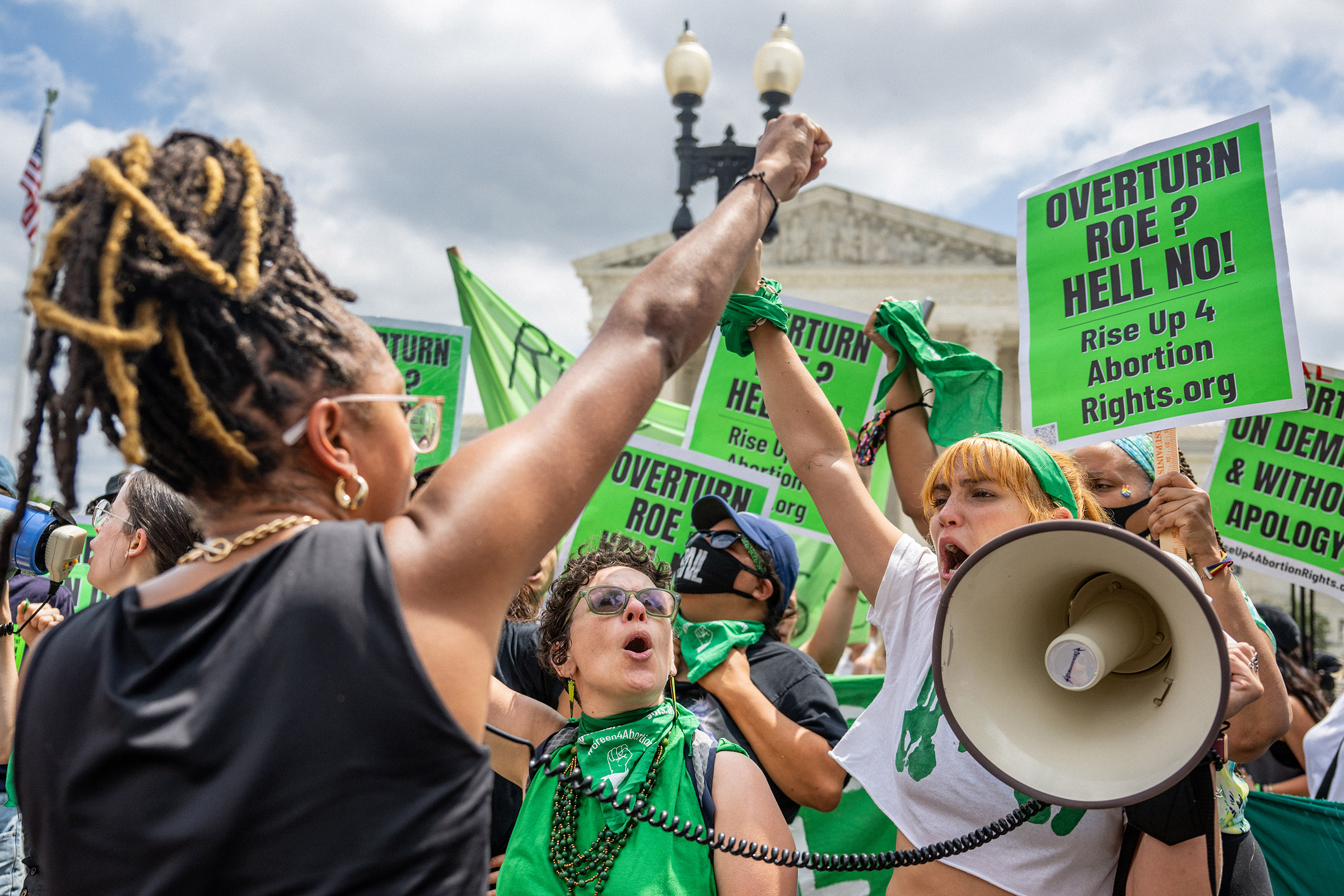 Abortion rights demonstrator Elizabeth White leads a chant in response to the Dobbs v Jackson Women's Health Organization ruling in front of the Supreme Court in Washington, D.C., on June 24, 2022.