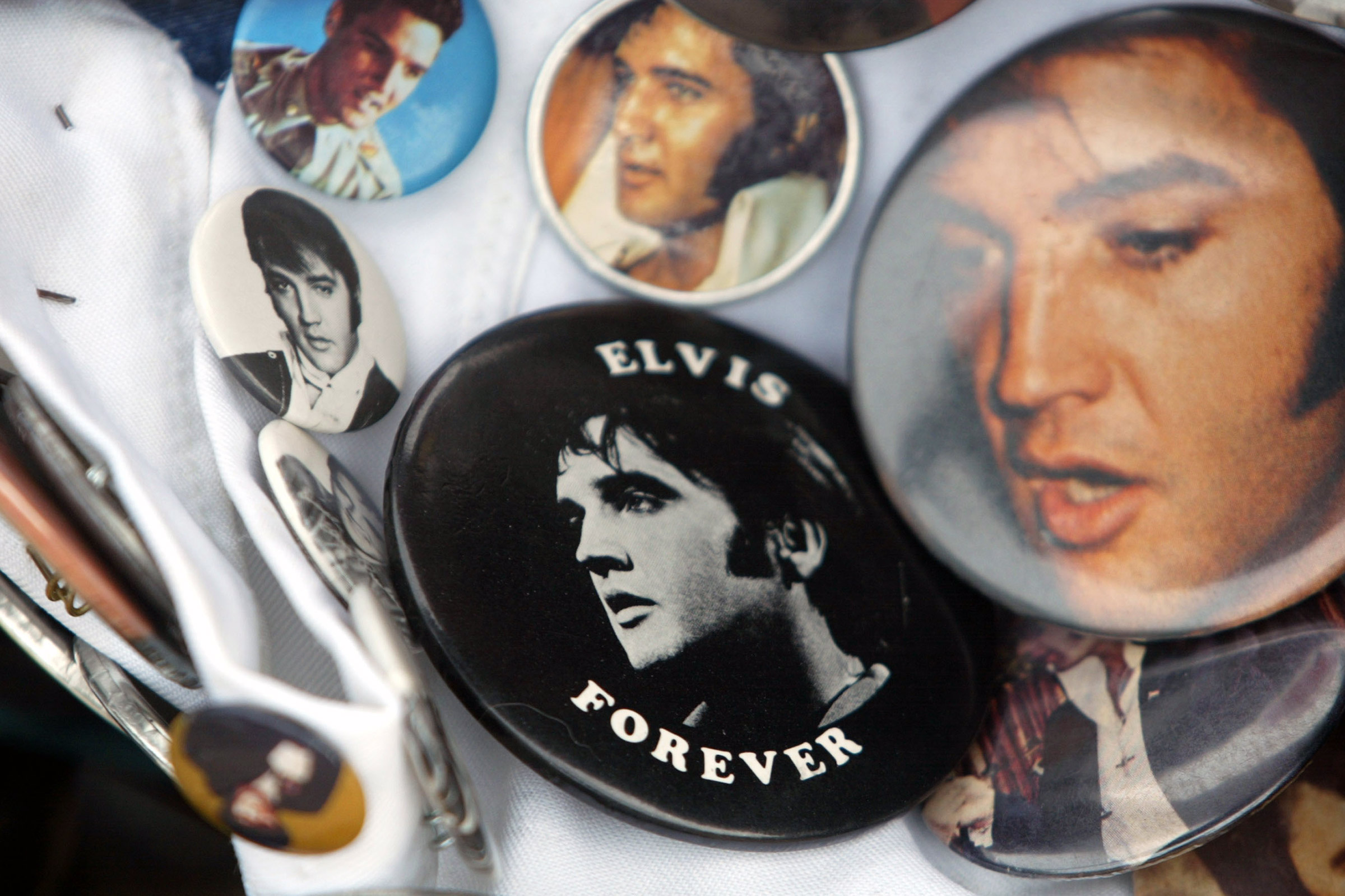 In 2022, the many faces of Elvis form a sun mosaic that raises more questions than it answers (Mario Tama—Getty Images)