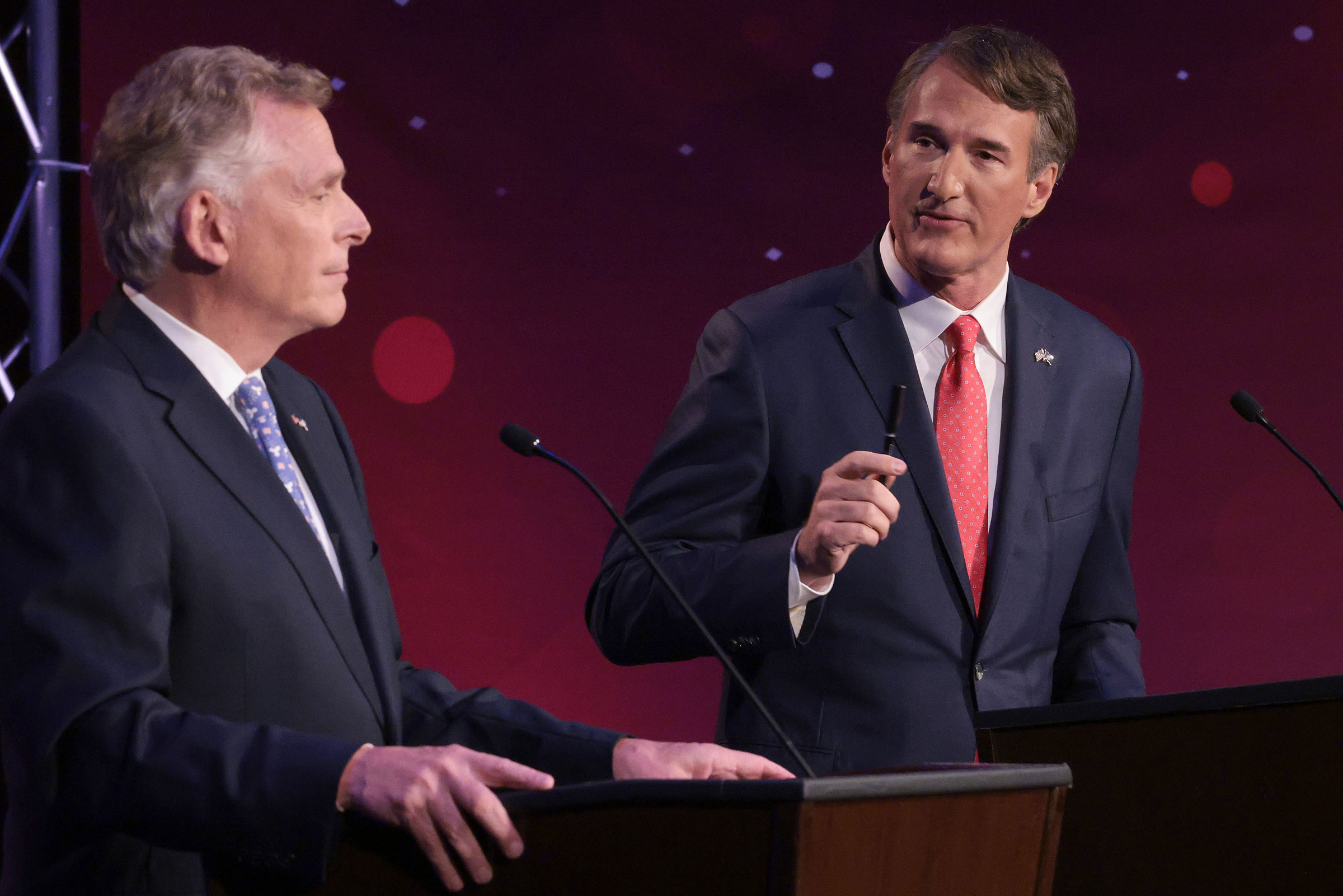Youngkin, right, debates former Virginia Gov. Terry McAuliffe in Alexandria, Va., in September (Win McNamee—Getty Images)
