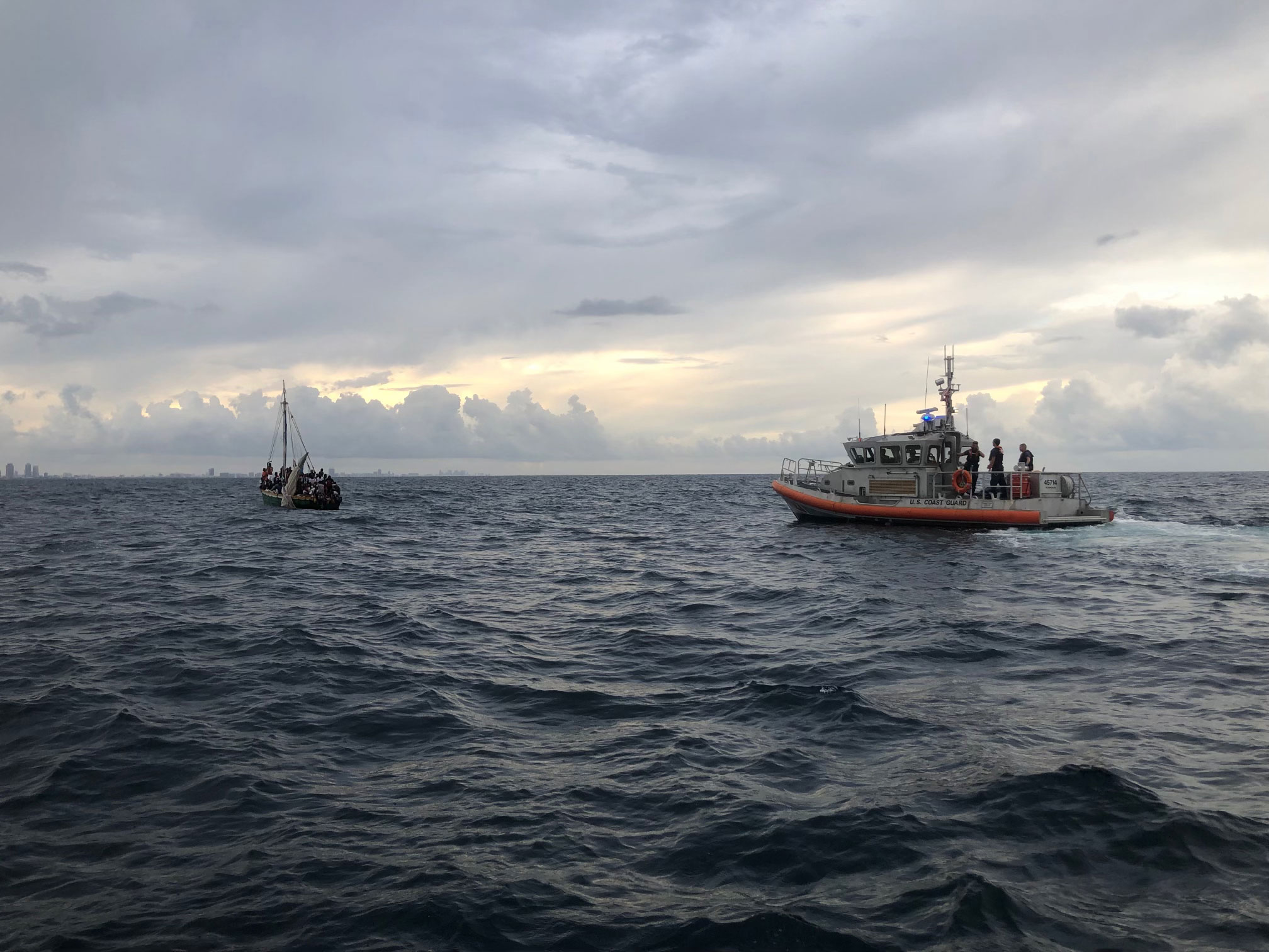 A Coast Guard Station Miami law enforcement crew interdicted 103 migrants aboard a 35-foot sailing vessel approximately 12 miles east of Biscayne Bay