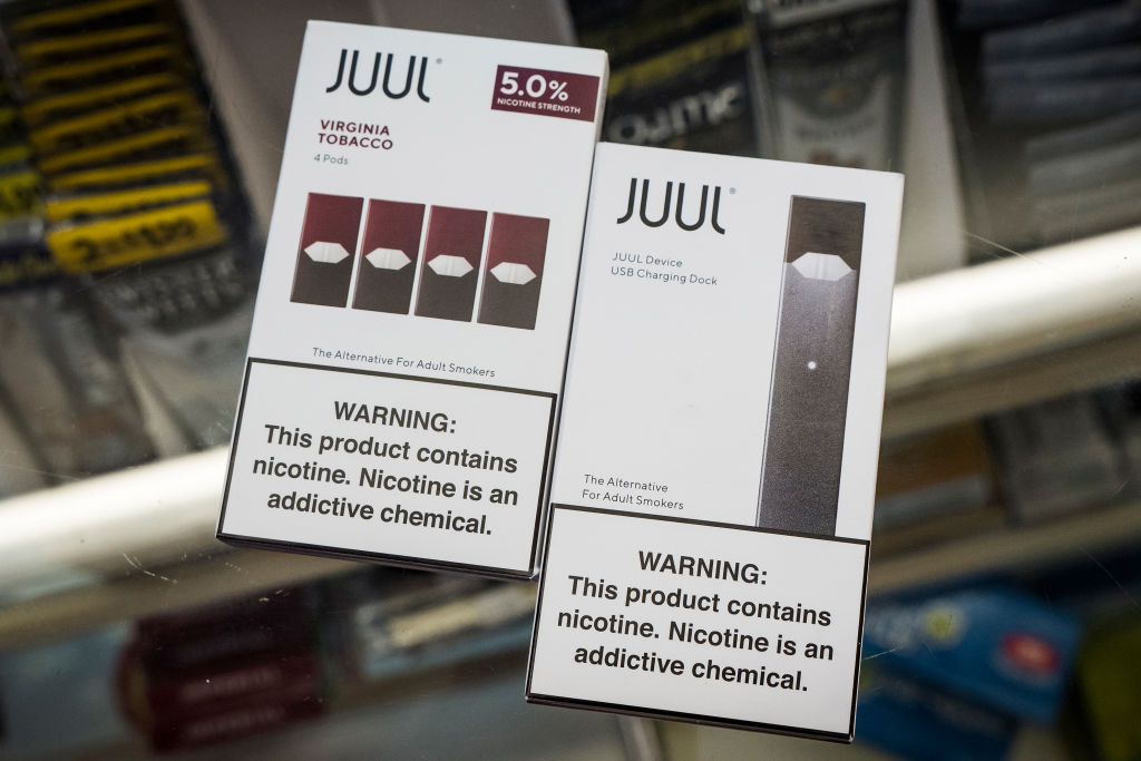 Juul's e-cigarette and Virginia Tobacco pods in a store in San Francisco on June 26, 2019. (Paul Morris—Bloomberg/Getty Images)