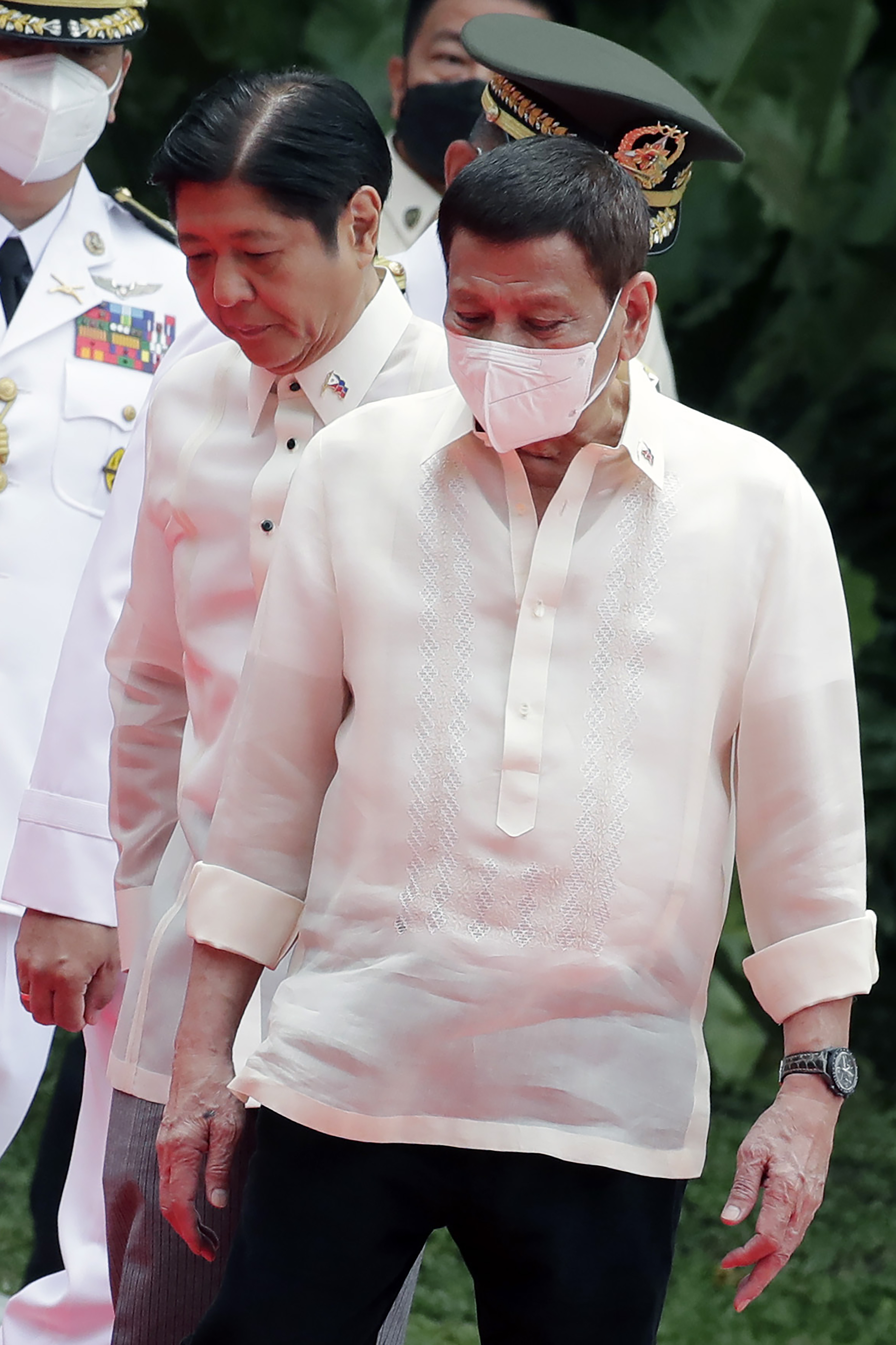 Incoming Philippine President Ferdinand Marcos Jr., left, and outgoing President Rodrigo Duterte, right, attend Marcos' inauguration ceremony at the Malacanang presidential palace grounds in Manila, Philippines, on June 30, 2022. (Francis R. Malasig—AP)