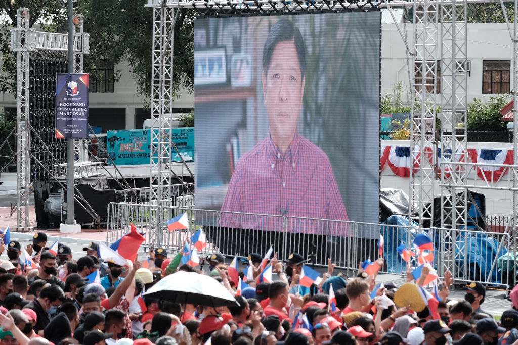 A promotional video of Ferdinand BongBong Marcos Jr. displayed on a screen at the Old Legislative Building in Manila, Philippines, on June 30, 2022. (Veejay Villafranca—Bloomberg/Getty Images)
