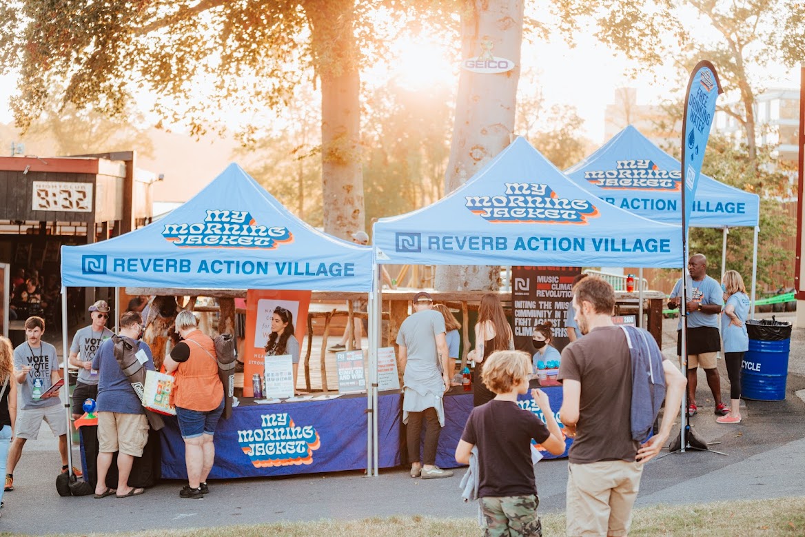 A REVERB Action Village at a July 2021 My Morning Jacket concert to register people to vote, and educate them about climate action opportunities (Courtney Boyer/REVERB)