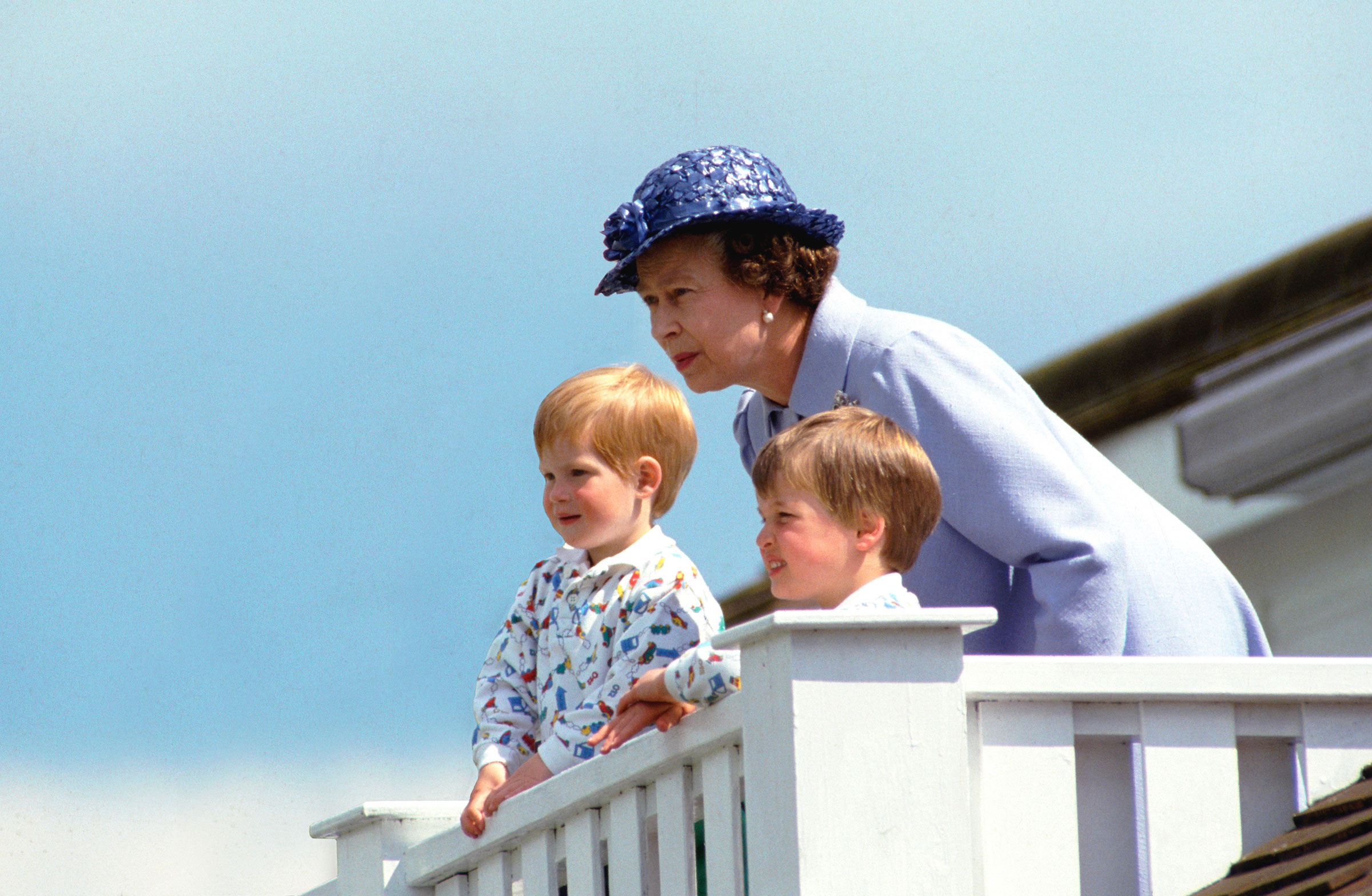 The Queen With Prince William And Prince Harry In The Royal Box At Guards Polo Club, Smiths Lawn, Windsor ca. 1987. (Tim Graham Photo Library/Getty Images)