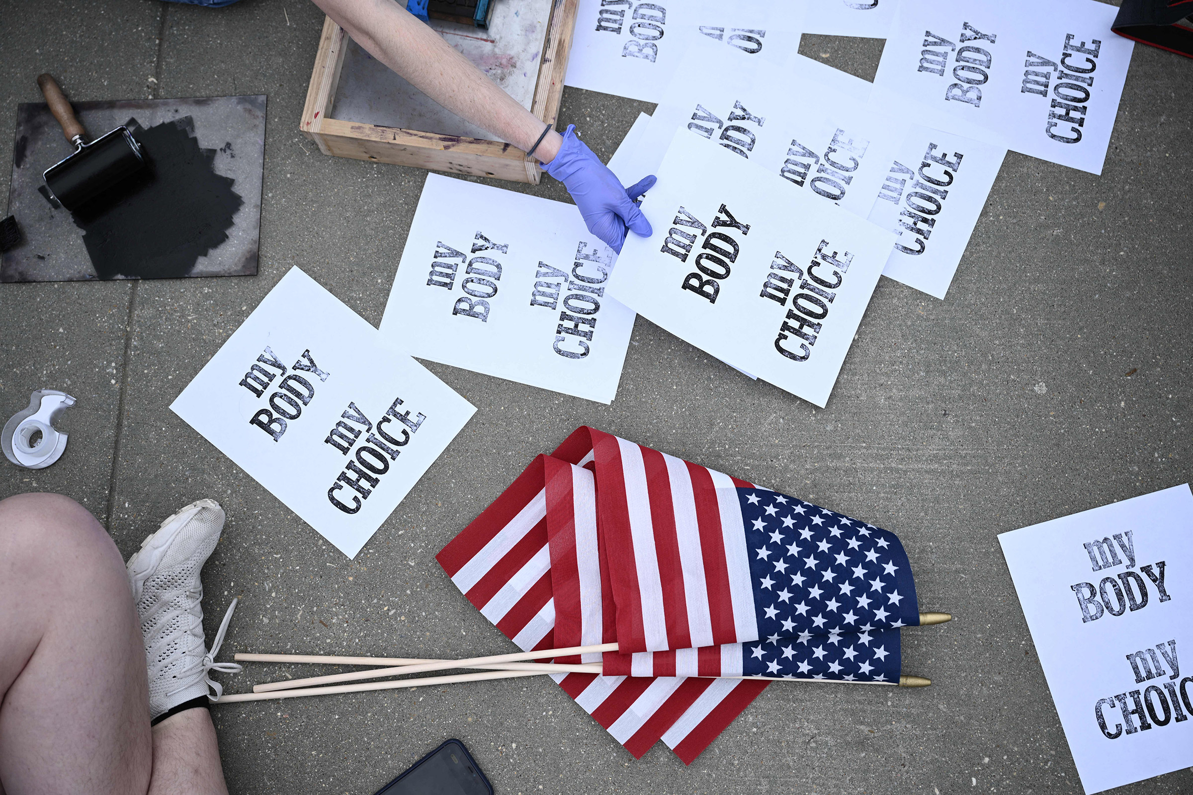 Pro-choice demonstrators make signs in front of the US Supreme Court in Washington, DC, on May 3, 2022. (Brendan Smialowski—AFP/Getty Images)