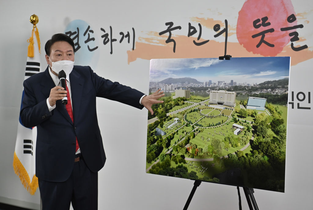 President-elect Yoon Suk-yeol shows a bird's eye view of his planned relocation of the presidential office during his press conference on March 20, 2022 in Seoul. (Jung Yeon-Je—Pool/Getty Images)