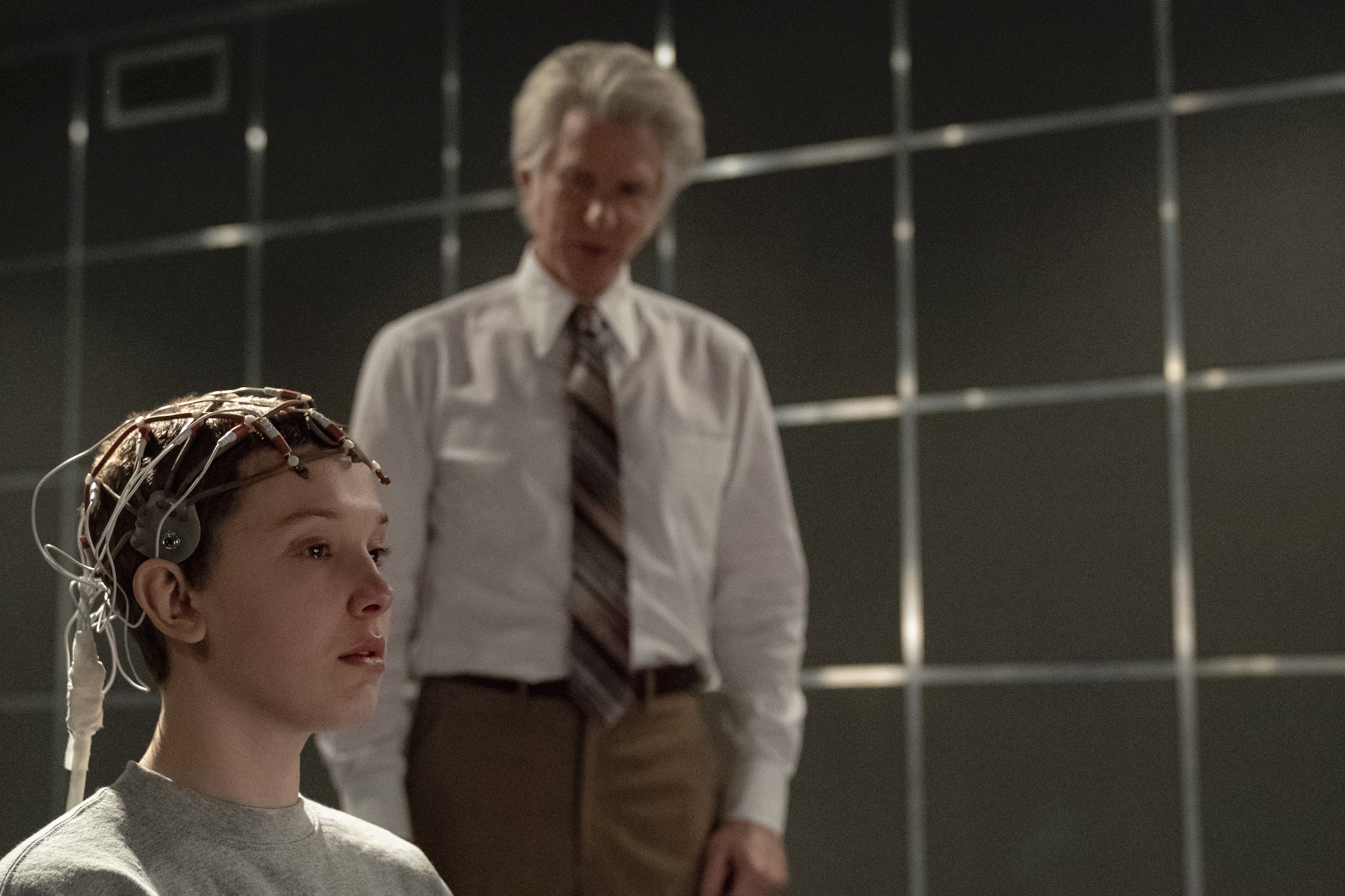 Millie Bobby Brown as Eleven and Matthew Modine as Dr. Martin Brenner in 'Stranger Things' (Tina Rowden—Netflix)