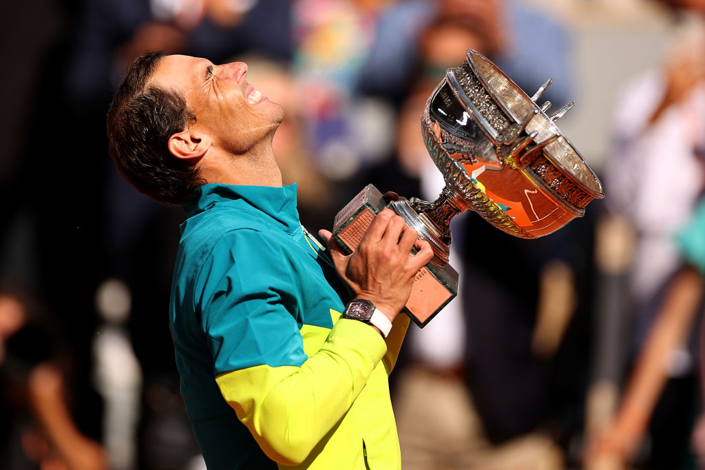 Rafael Nadal of Spain celebrates with the trophy after winning against Casper Ruud of Norway during the Men's Singles Final match on Day 15 of The 2022 French Open at Roland Garros on n Paris, France, on June 05, 2022. (Ryan Pierse—Getty Images)