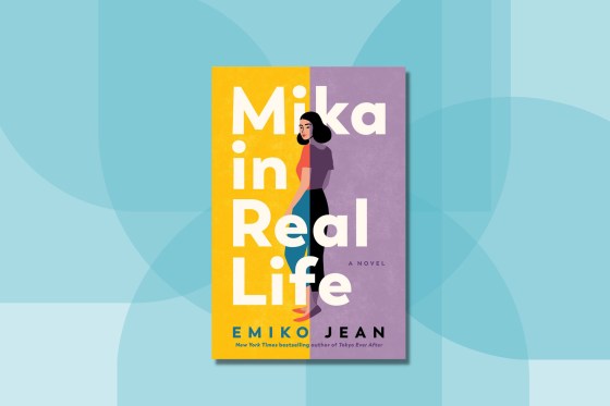 The cover of Mika in Real Lifeâ€”the left side is yellow, the right side is purple, and Mika walks through the middle