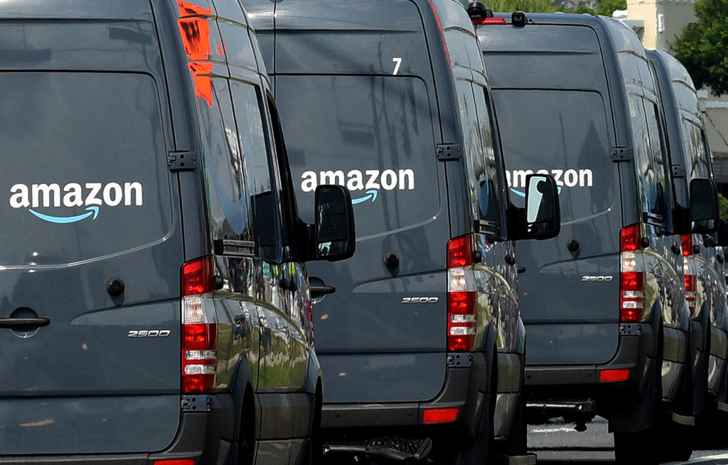 Amazon delivery vans are seen on May 14, 2019 in Orlando, Florida. (Paul Hennessy—NurPhoto/Getty Images)