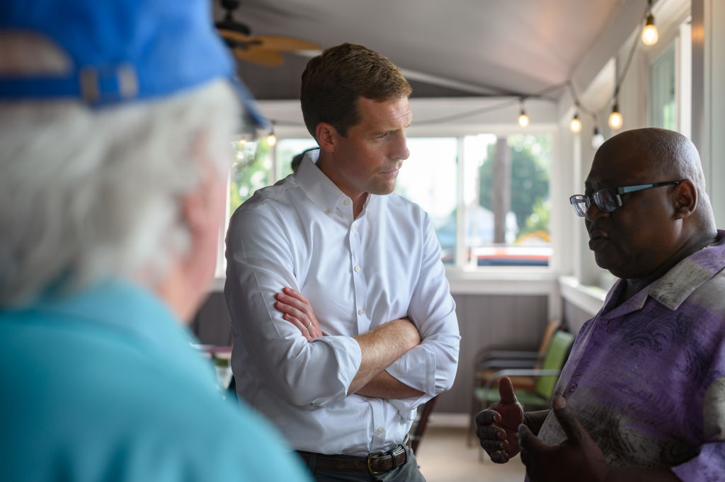 U.S. Rep. Conor Lamb, Democrat of Pennsylvania, talks with constituents at Riardos Bar and Grill on August 6, 2021 in New Castle, Penn. (Jeff Swensen—Getty Images)