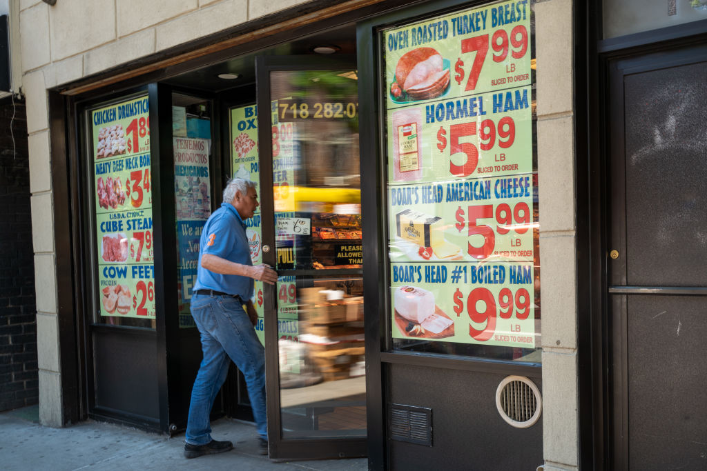 Prices are advertised outside of a grocery store along a busy shopping street in the Flatbush neighborhood of Brooklyn on June 15, 2022 in New York City. (Spencer Platt/Getty Images)