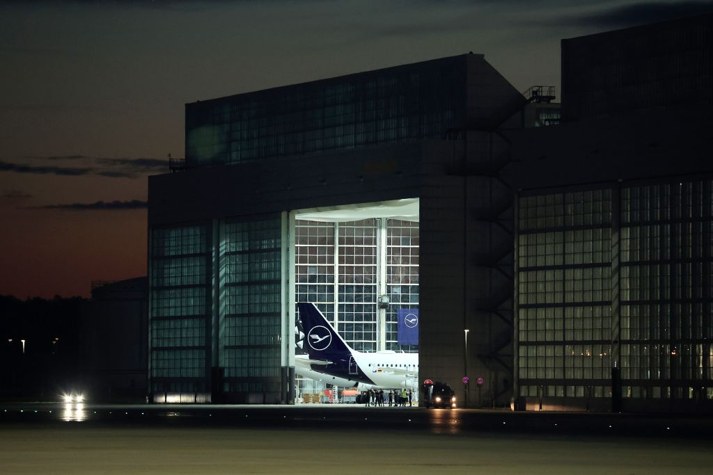 A passenger aircraft, operated by Deutsche Lufthansa AG, in a hangar at Munich International Airport in Munich, Germany, on Saturday, June 25, 2022. (Krisztian Bocsi—Bloomberg/Getty Images)