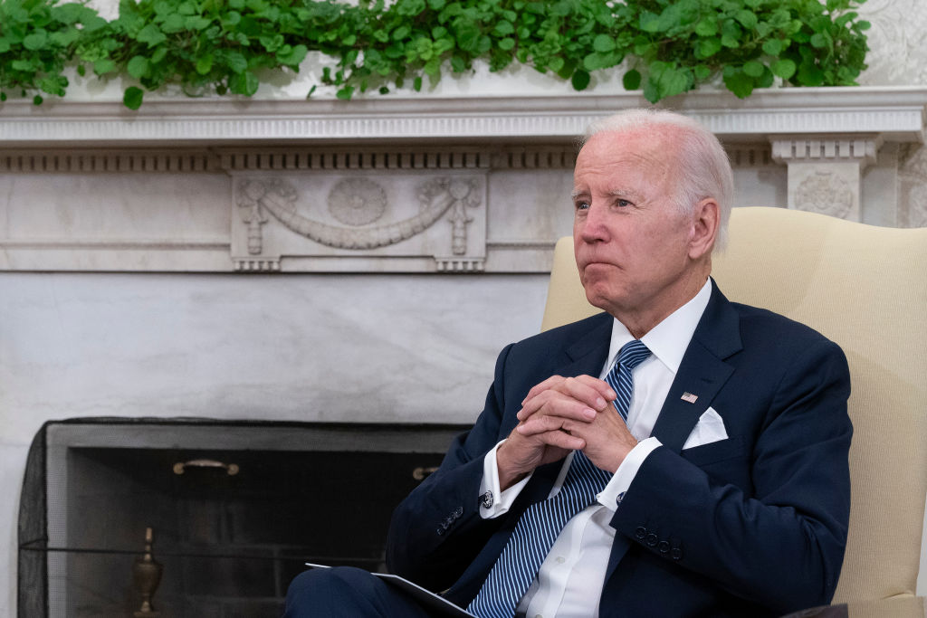 President Joe Biden listens to Mexican President Andres Manuel Lopez Obrador as they talk to journalists in the Oval Office at the White House on July 12, 2022 in Washington, DC. (Chris Kelponis/Getty Images)